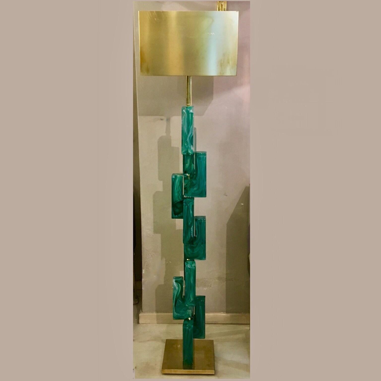 Emerald green Murano glass floor lamp, green melange handmade full glass blocks, rectangular brass lampshade and brass structure.