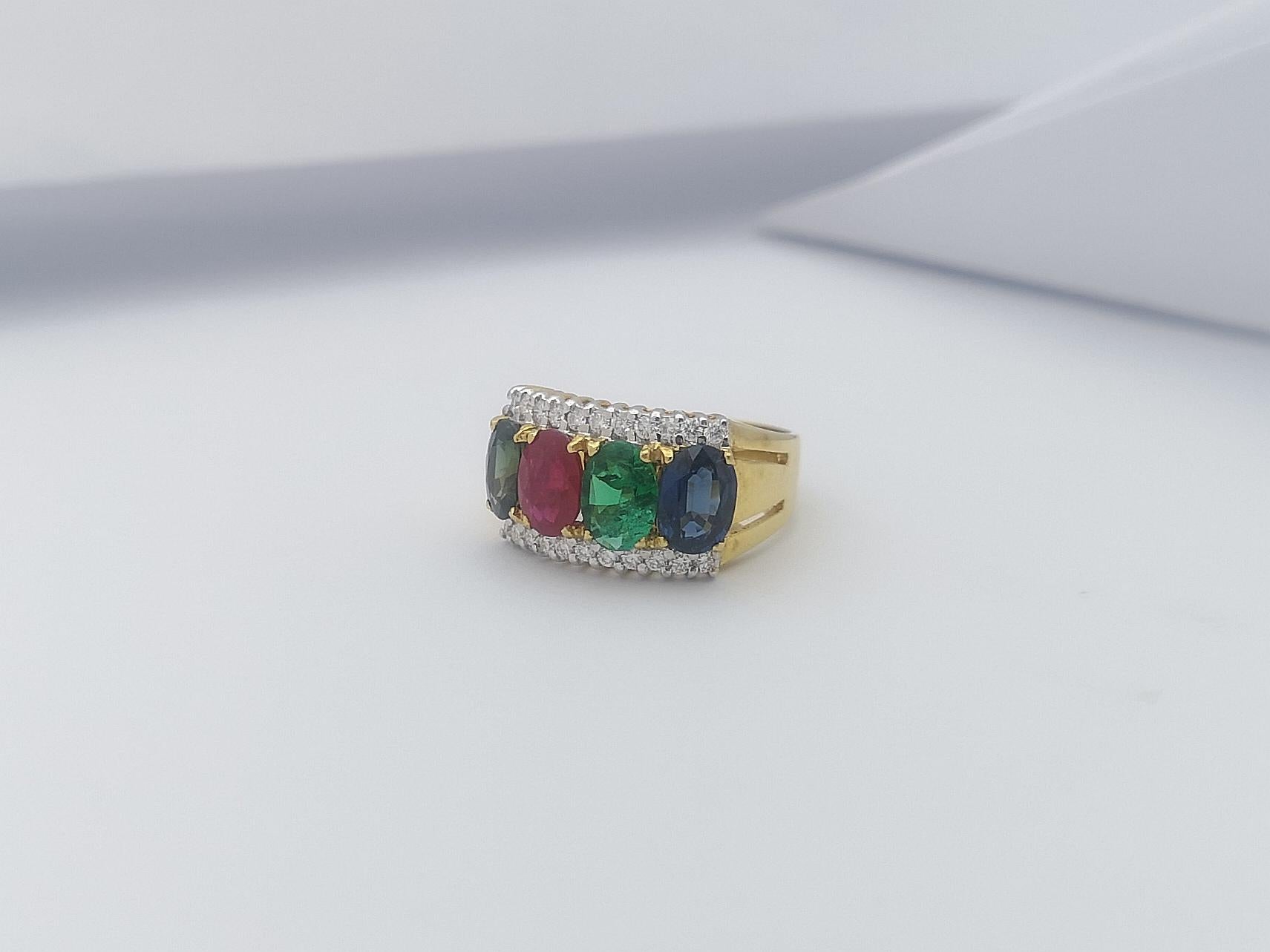 Emerald, Green Sapphire, Ruby, Blue Sapphire Ring Set in 18 Karat Gold Settings For Sale 1