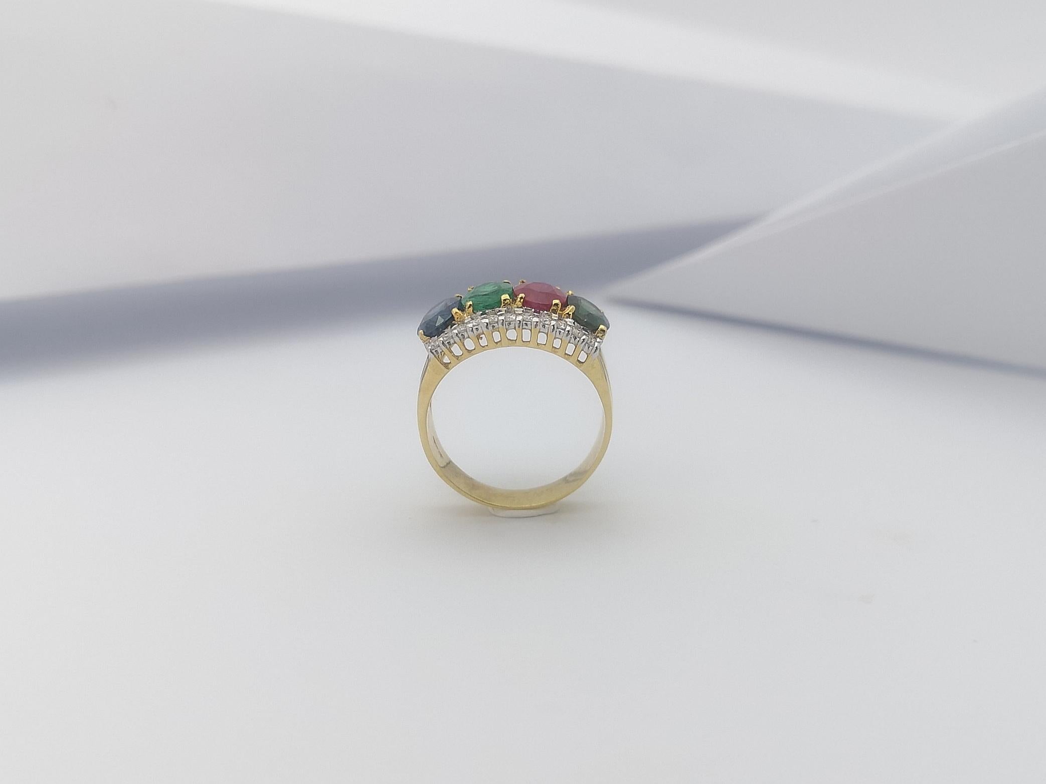 Bague en or 18 carats sertie d'émeraudes, de saphirs verts, de rubis et de saphirs bleus en vente 6