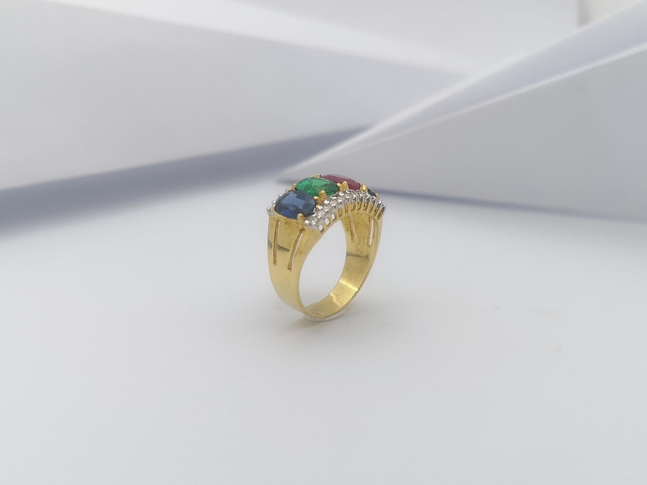 Bague en or 18 carats sertie d'émeraudes, de saphirs verts, de rubis et de saphirs bleus en vente 8