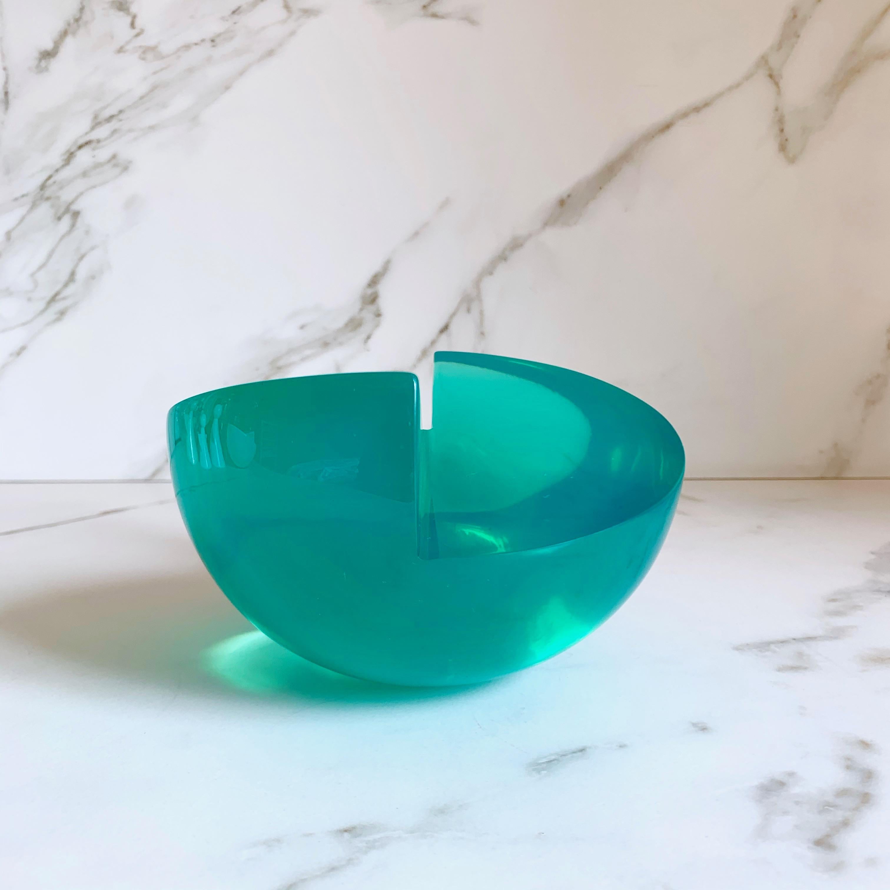 This Geometric sculpture is handmade in polished resin in a variety of colors. It is a modern and colorful piece that will liven up any space.

Our Semi Sphere is a very cool and fun piece! It can be transformed into a complete sphere when you
