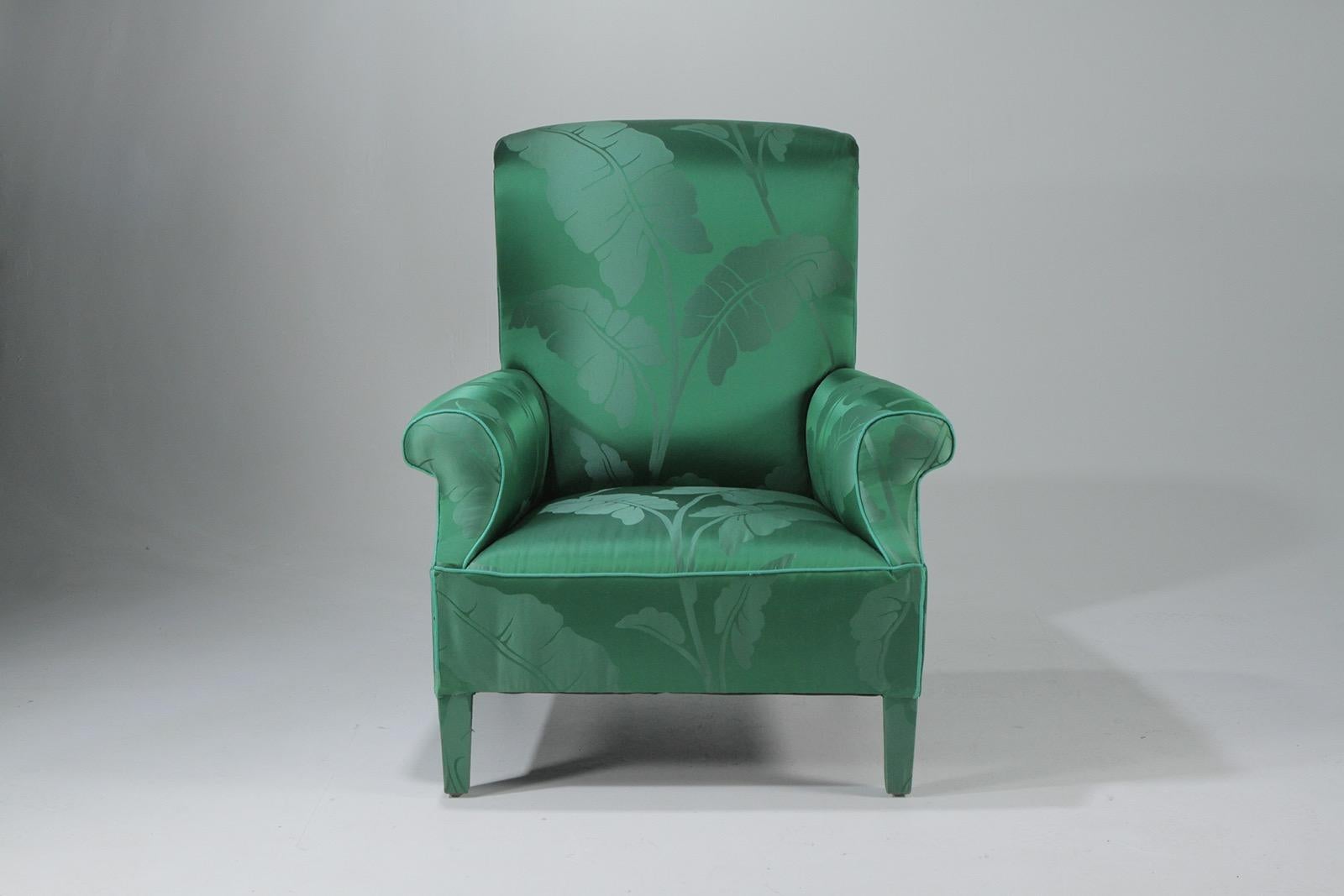 Eye-catching elegant antique club chair upholstered in a gorgeous emerald green silk.