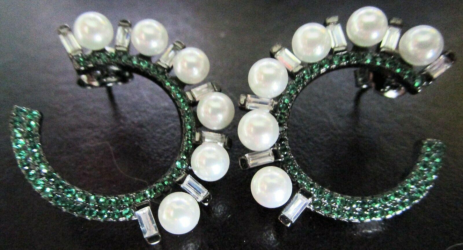 Simply Awesome! Faux Green Emerald, Sparkling Baguette Ice CZ and Faux Pearl Sterling Silver Hoop Earrings. Encrusted with pave Hand set sparkling Green Emeralds, Sparkling Ice CZ and Faux Pearl in Sterling Silver mounting. Measuring approx. 1”.
