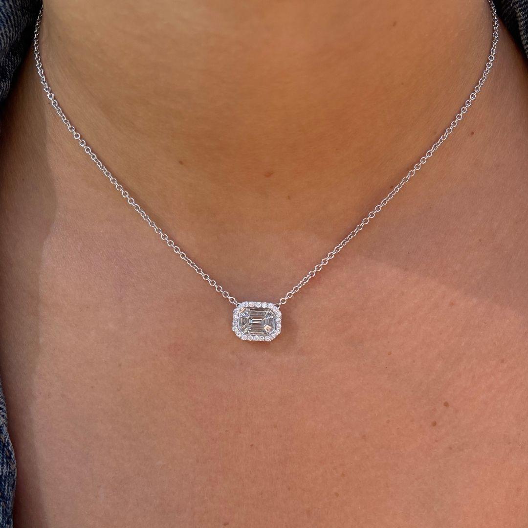 Emerald Diamond Necklace in 14k White Gold Halo Diamond Pendant, Shlomit Rogel

Make everyday sparkle! A classic design with a geometric design, this emerald pendant necklace features a halo of glittering small white diamonds and an array of