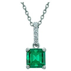Emerald Hanging off a Diamond Bail White Gold Drop Pendant Necklace