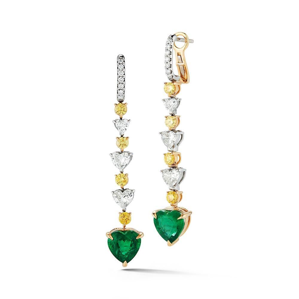 EMERALD HEART SHAPE EARRING
A vibrant color combination from the luscious emeralds and bright yellow diamonds makes these earrings pop.
Item:	# 02954
Setting:	18K W/Y
Lab:	C.Dunaigre
Color Weight:	4.09 ct. of Emerald
Diamond Weight:	2.9 ct. of