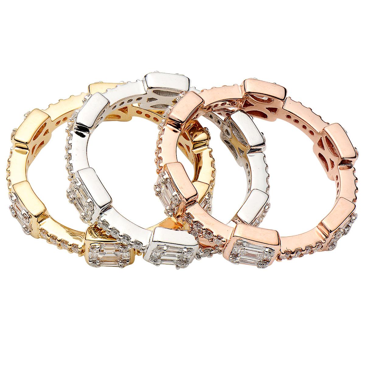 This stunning set of 3 rings, 1 of each 18 karat white gold, 18 karat rose gold, and 18 karat yellow gold perfectly stack together to create a gorgeous stacking ring. Each ring can also be worn alone for a single band look. The diamonds are