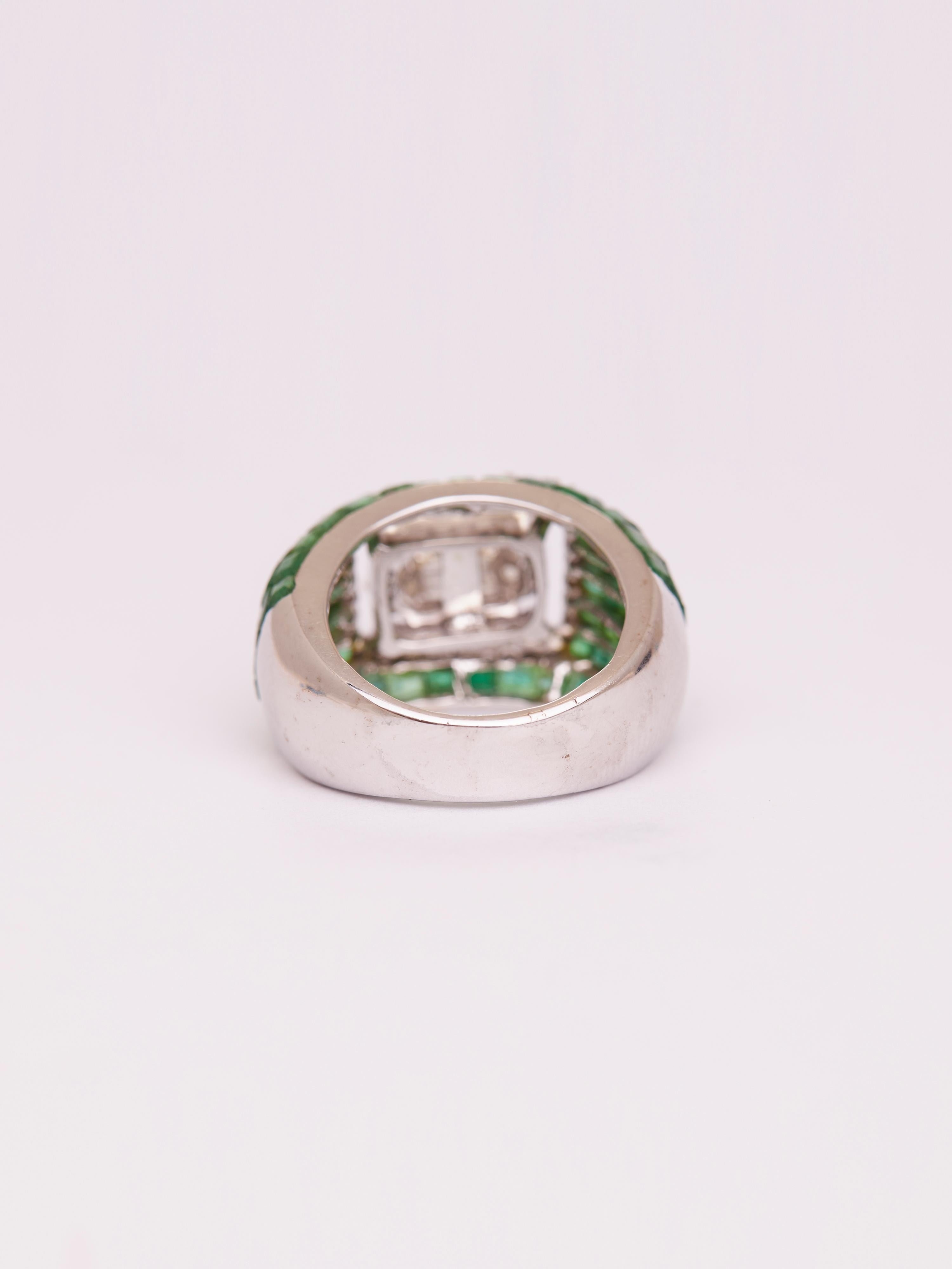 Total wt-13.310gm, Gold 14KT-11.864gm, Natural Diamonds-1/1.35cts, Natural Diamonds Round-34/0.21cts,  Emerald-77/5.67cts