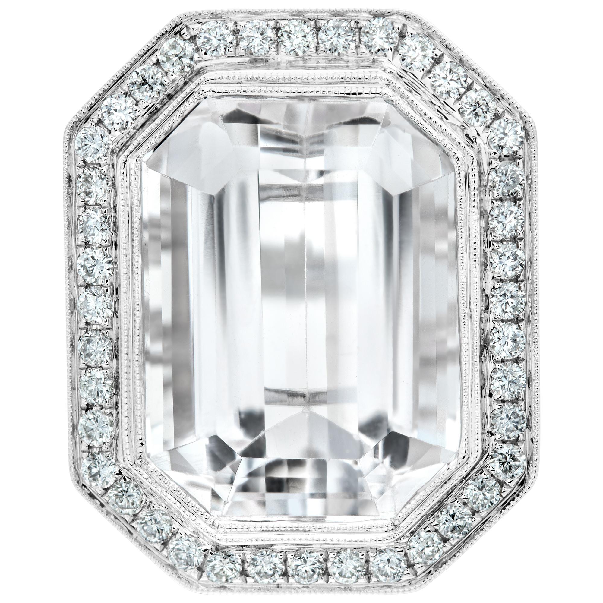 Cut cornered emerald brilliant cut 18.81 carats white Kunzite ring in 18k white gold. Round brilliant cut diamonds total approx. weight: 1.00 carat. Size 6.5, Center measurements: 24mm x 19mm.

This Kunzite ring is currently size 6.5 and some items