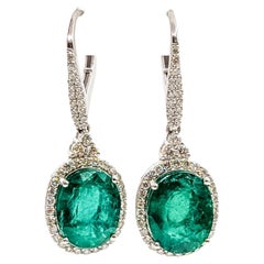Orecchini a goccia con smeraldo in platino