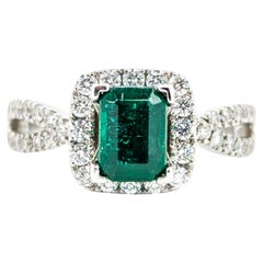 Emerald Majesty: 14k White Gold Ring with Diamond Accents