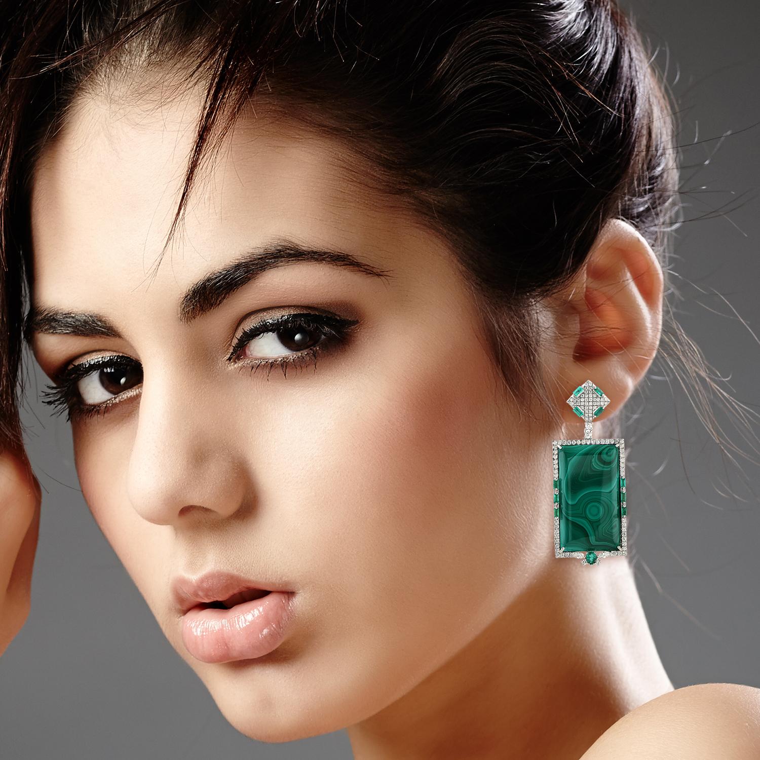 Handcrafted from 18-karat gold, these beautiful earrings are set with 1.51 carats emerald, 50.55 carats Malachite and 1.89 carats of glimmering diamonds.

FOLLOW  MEGHNA JEWELS storefront to view the latest collection & exclusive pieces.  Meghna