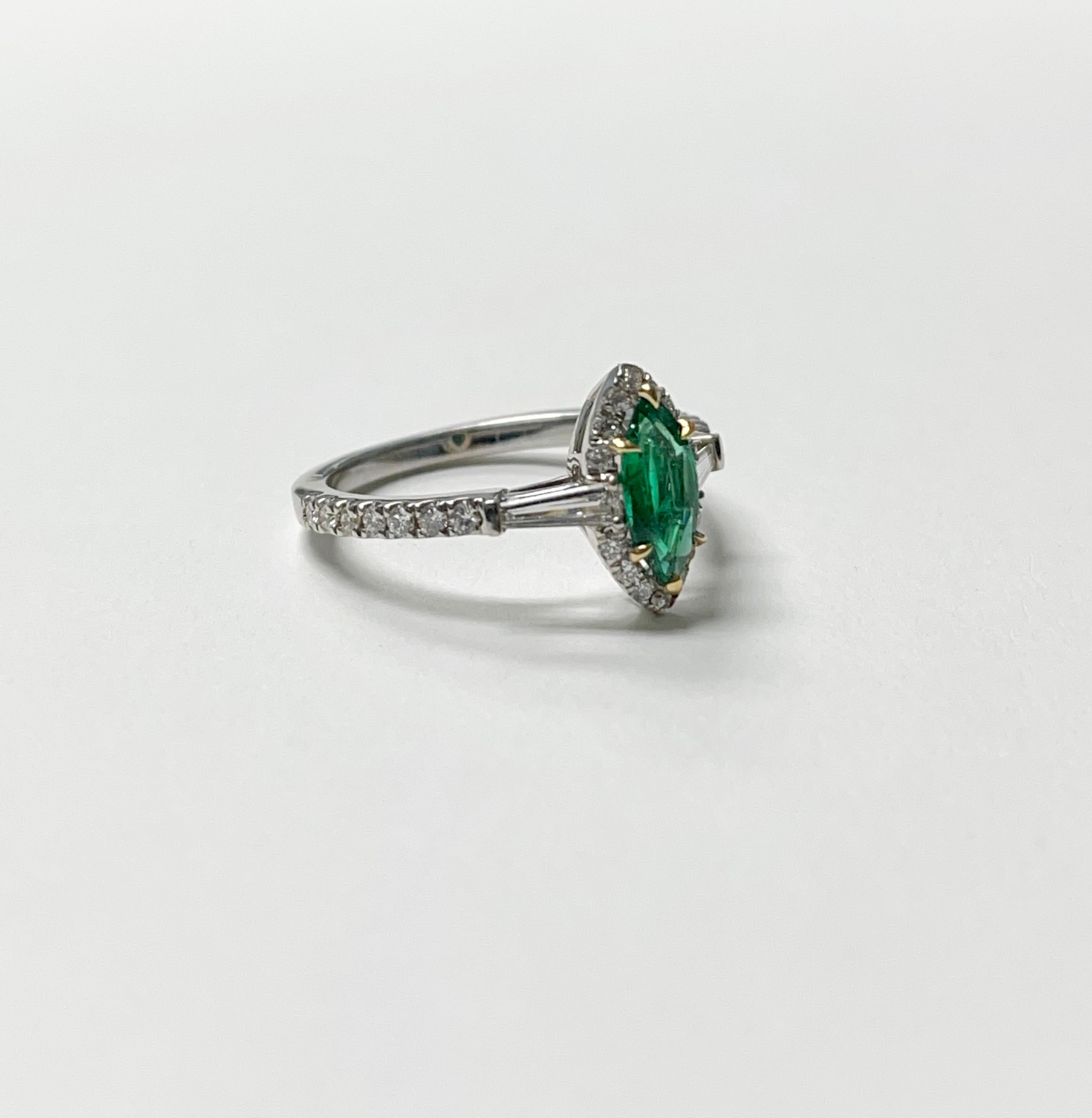 marquise cut emerald ring white gold