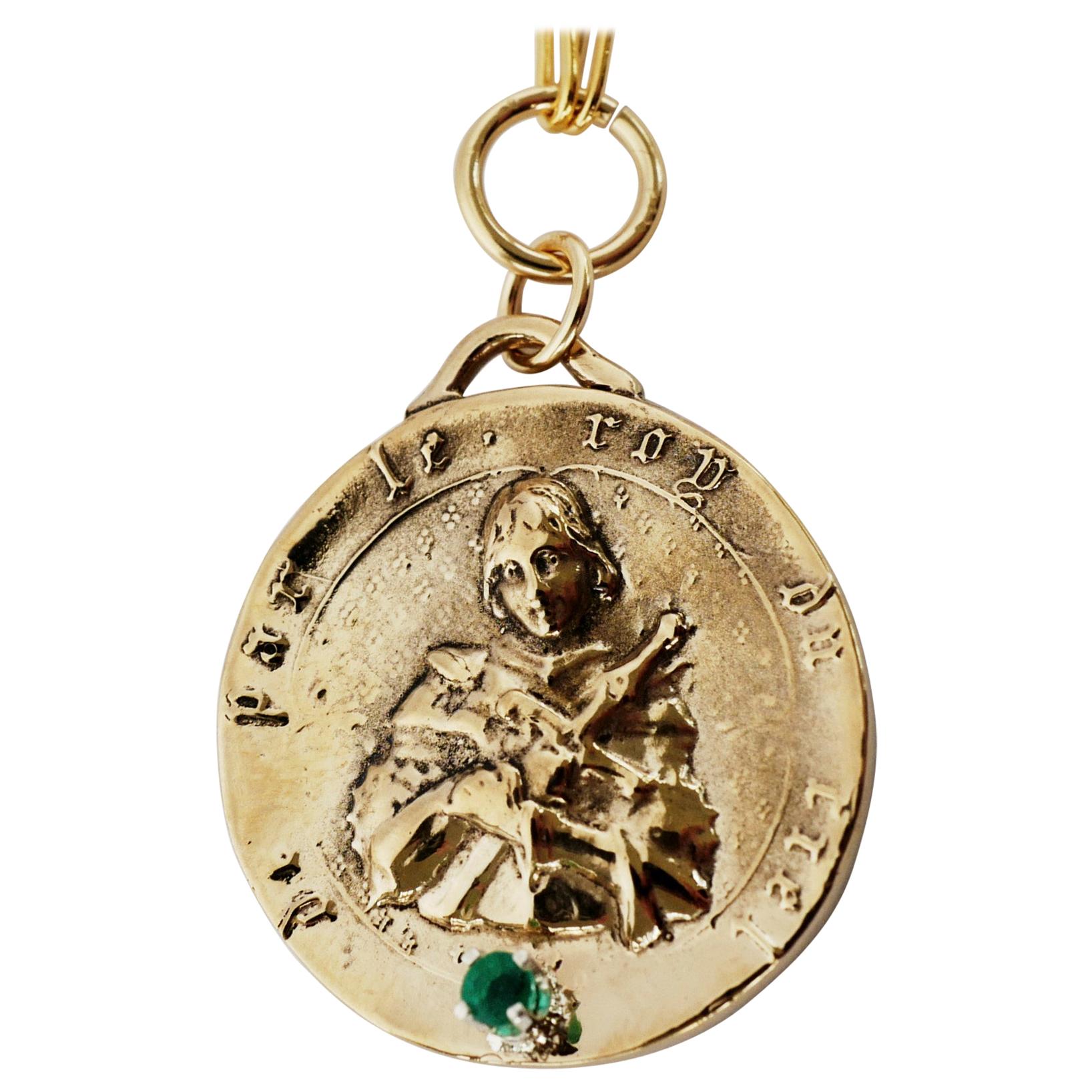 Emerald Set on a Medal Pendant of Joan of Arc, the chunky chain necklace is gold filled J Dauphin

Exclusive piece with Joan of Arc Medal Round Coin pendant in Bronze with an Emerald and a gold filled Chain. Necklace is 24