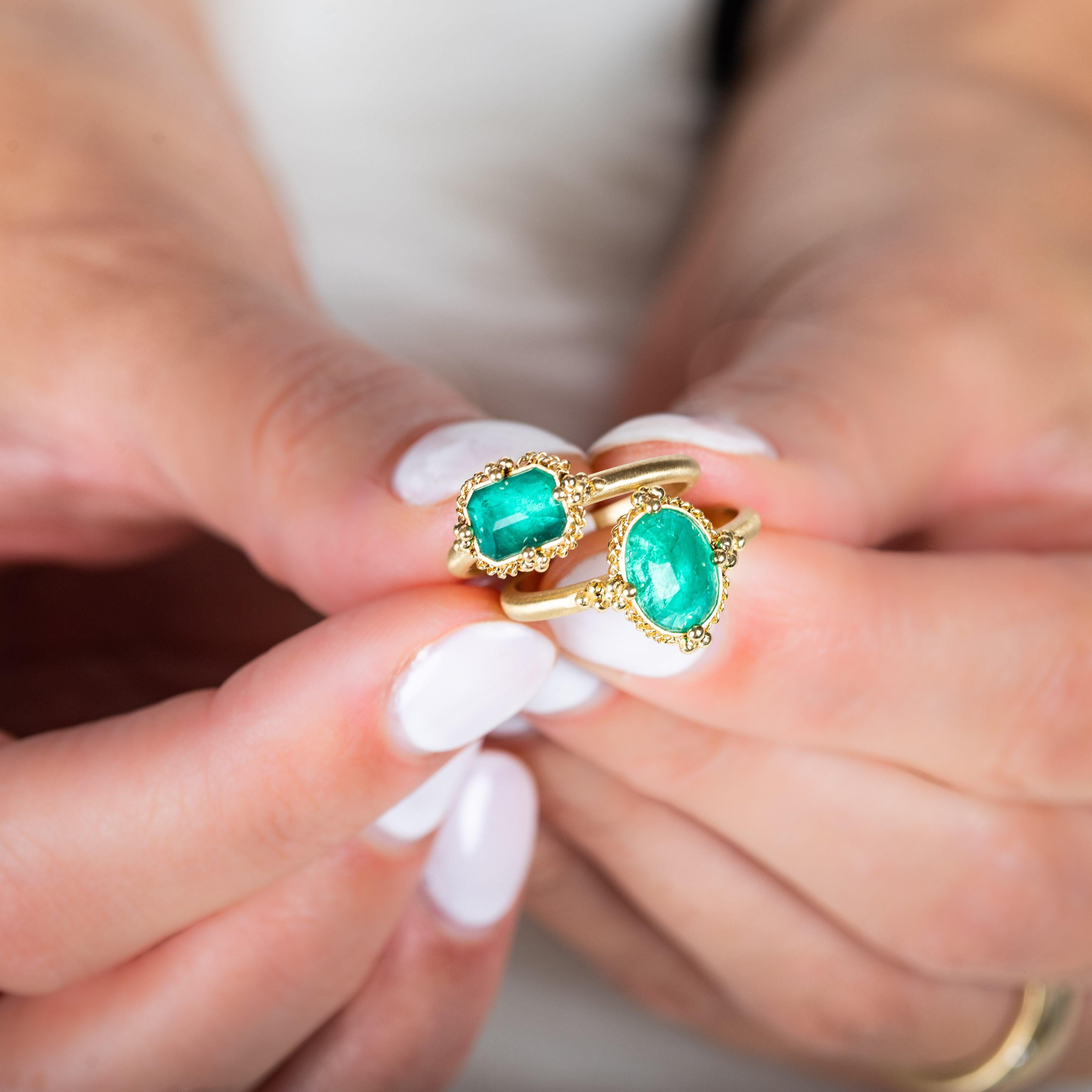 With its combination of lush, deep green and velvety gold, this ring embodies restrained luxury. We honored the natural beauty of this gemstones by encasing it in an intricate frame of shimmering golden chain and delicate beaded prongs. One of a