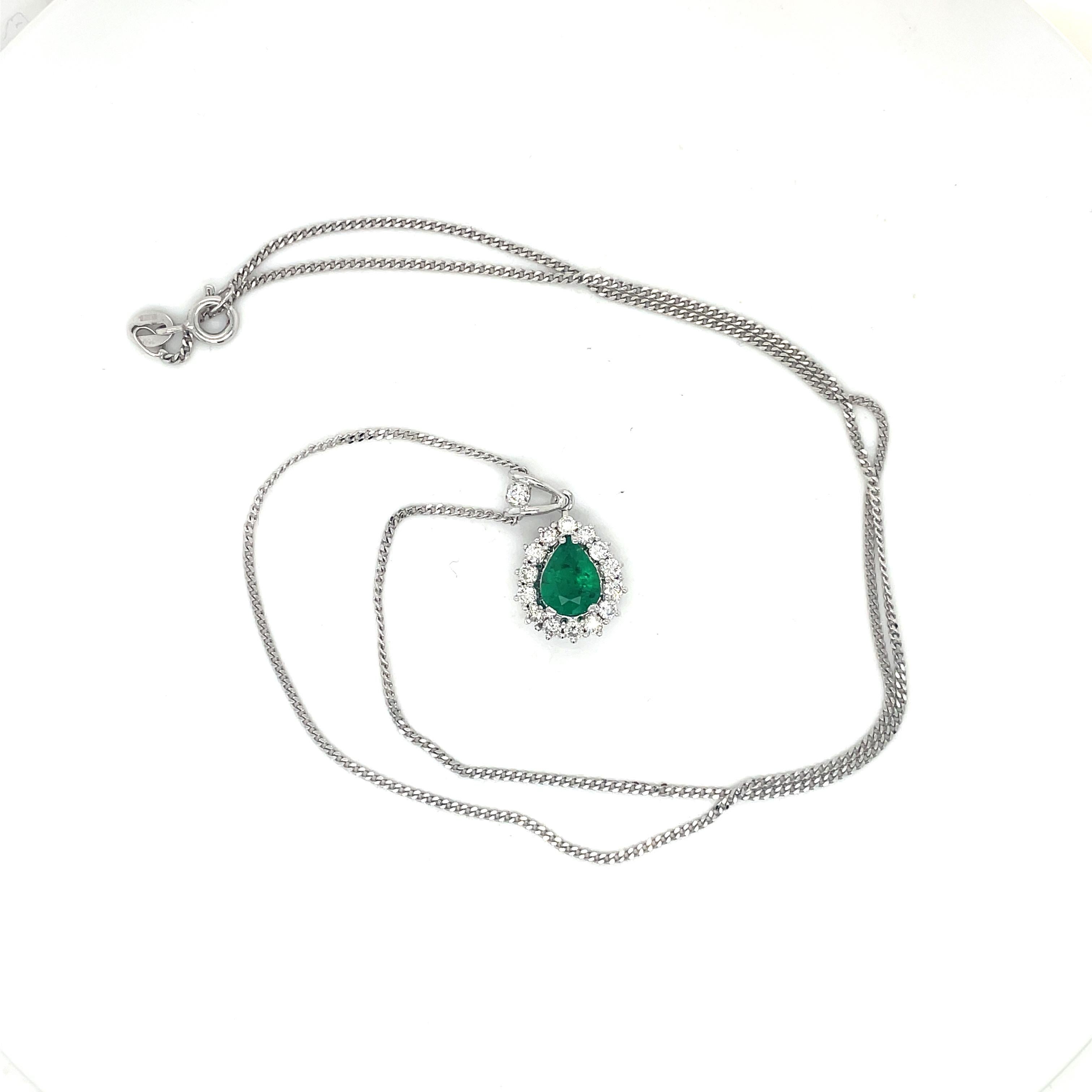 Emerald Necklace Pendant - 0.59ct Emerald and 0.5ct Diamond Halo, 18K White Gold In Excellent Condition For Sale In Ramat Gan, IL