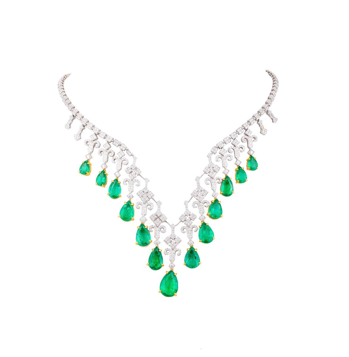 Necklace in 18 k white gold,
Colombian emeralds in 18 k yellow gold
32,24 ct emerald drops
5.40 ct diamonds W/vsi-si
Length 46 cm and an extension for insertion of 4.5 cm
Weight 58,8 Gramm