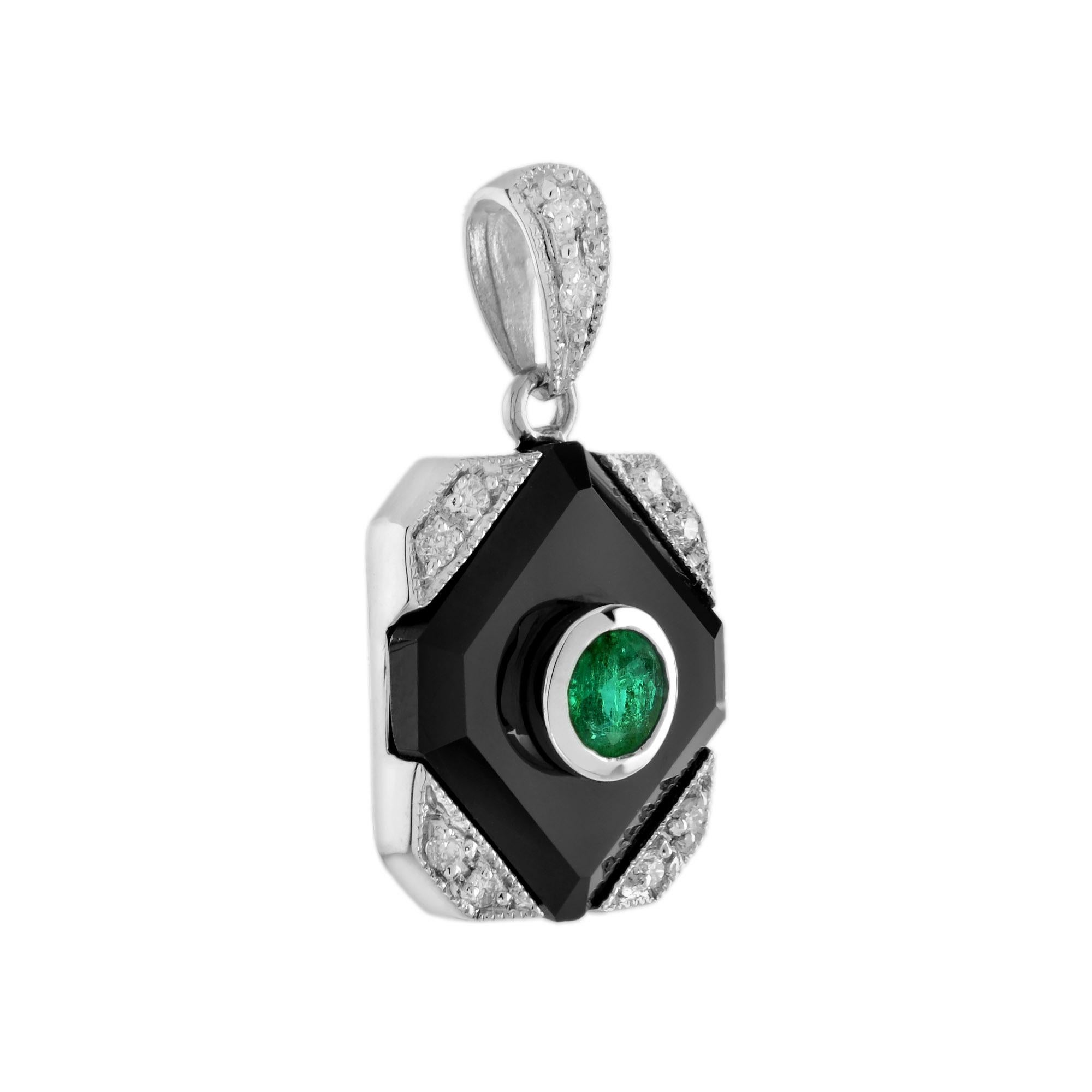 14k white gold Art Deco style emerald, onyx, and diamond pendant, centrally set with a round emerald with in an octagon shaped black onyx frame, surrounded by ten grain set diamonds totaling 0.09 carat. A fine piece jewelry you will cherish in your