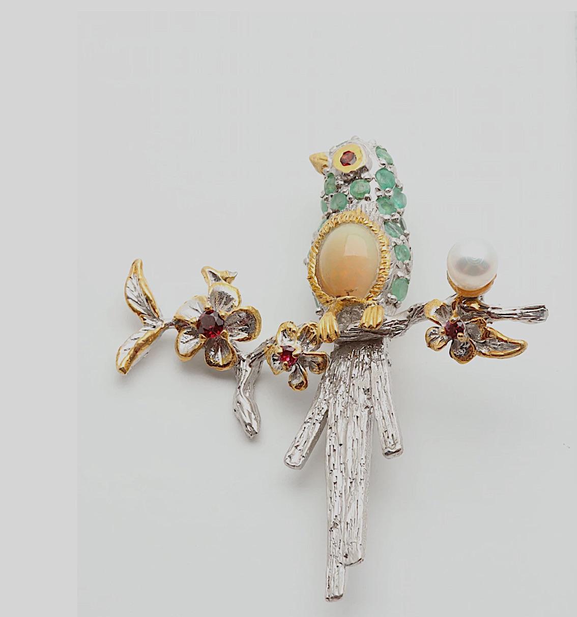 This is a most charming and inspired design and a lovely accent to any outfit.

a Beautiful Vintage Colorful Gemstone Sterling Silver and Vermeil Bird Brooch! 
the embellished Sterling and Vermeil Accent Bird Sitting on a Tree Branch with Bird's