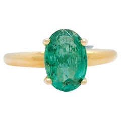 Emerald Oval and 14k Yellow Gold Ring