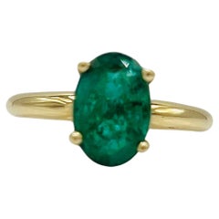 Emerald Oval and 14k Yellow Gold Ring
