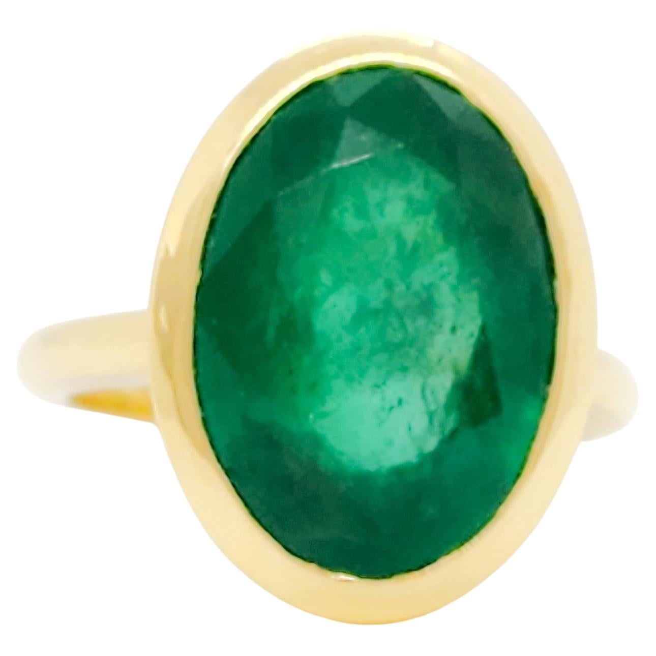 Emerald Oval and 18k Yellow Gold Ring