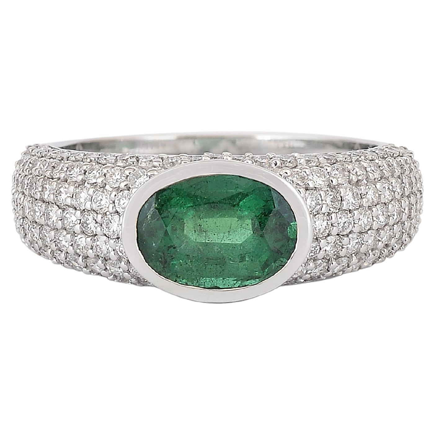 Emerald Oval and Diamond classic ring in 18K White Gold