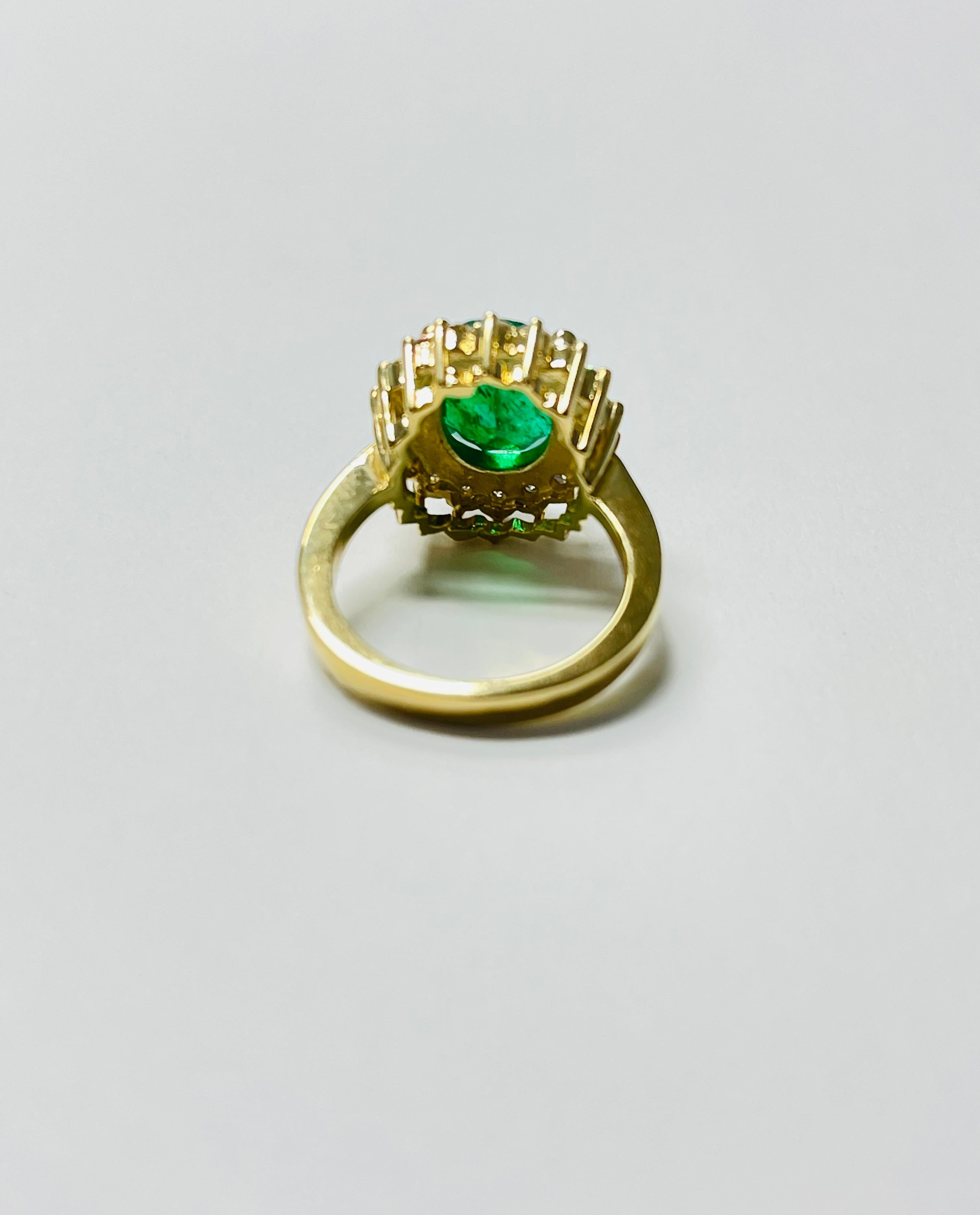 Emerald Oval And Diamond Engagement Ring In 18 Karat Yellow Gold. In New Condition For Sale In New York, NY