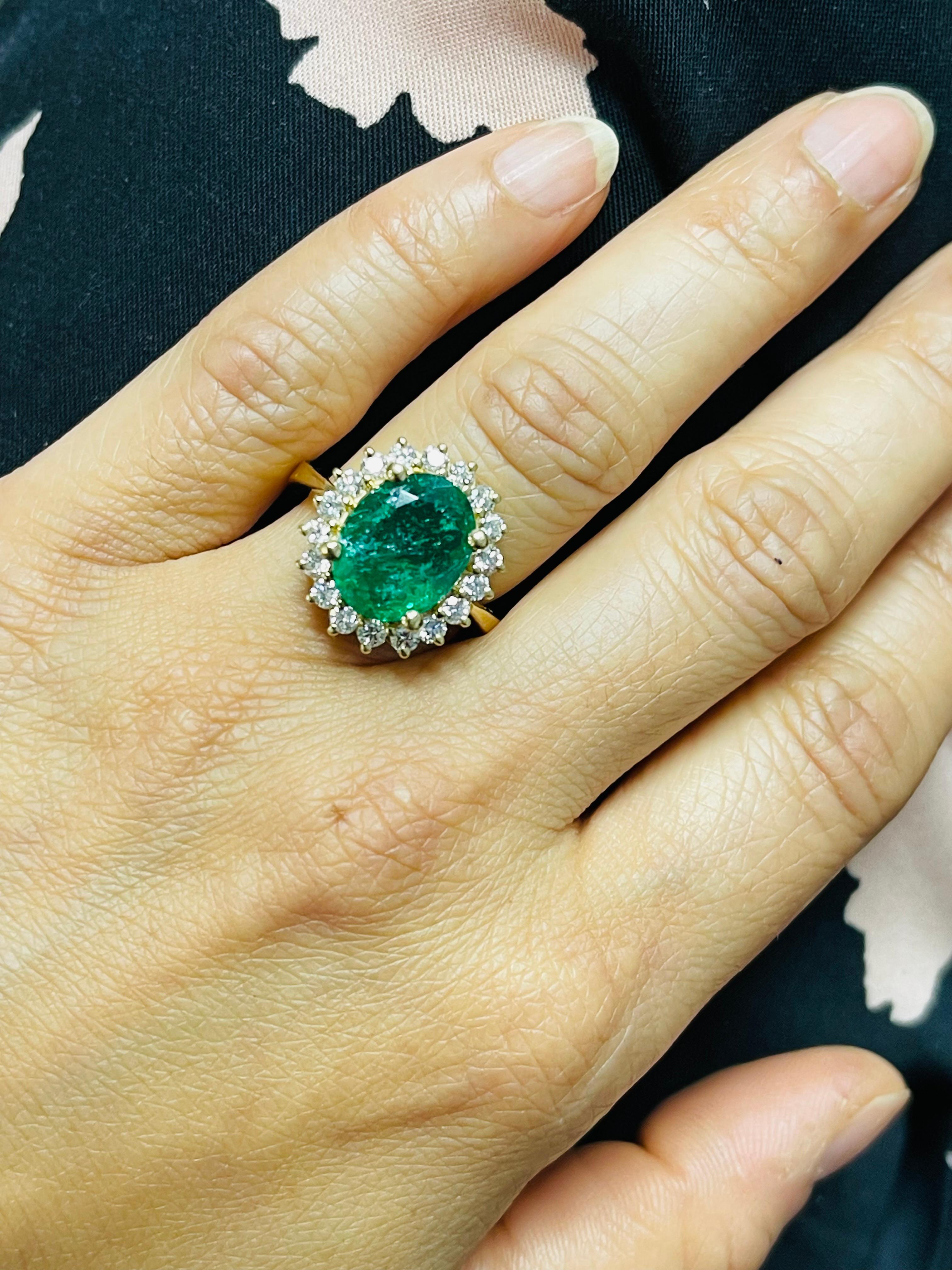 Emerald Oval And Diamond Engagement Ring In 18 Karat Yellow Gold. For Sale 1