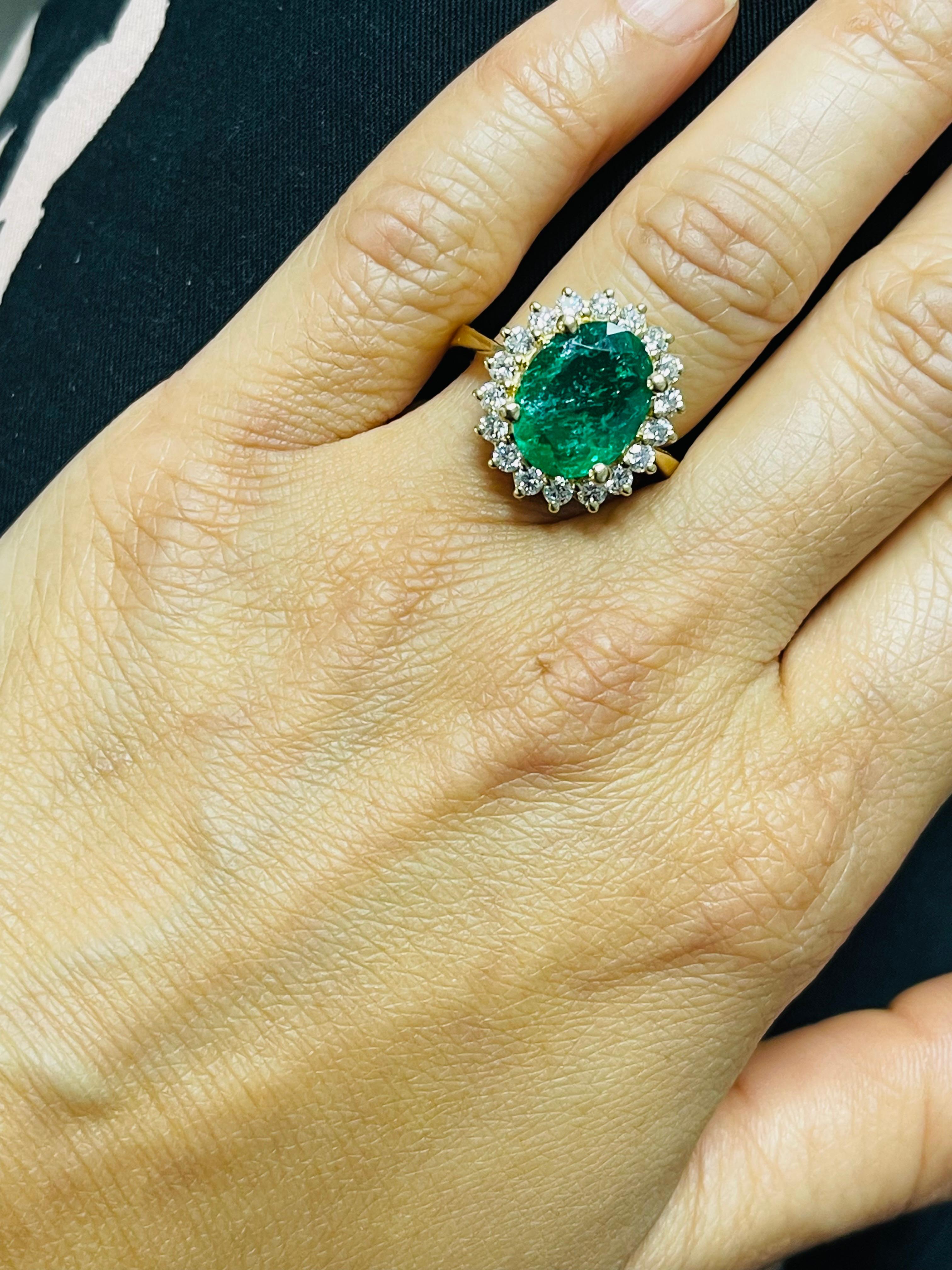 Emerald Oval And Diamond Engagement Ring In 18 Karat Yellow Gold. For Sale 2