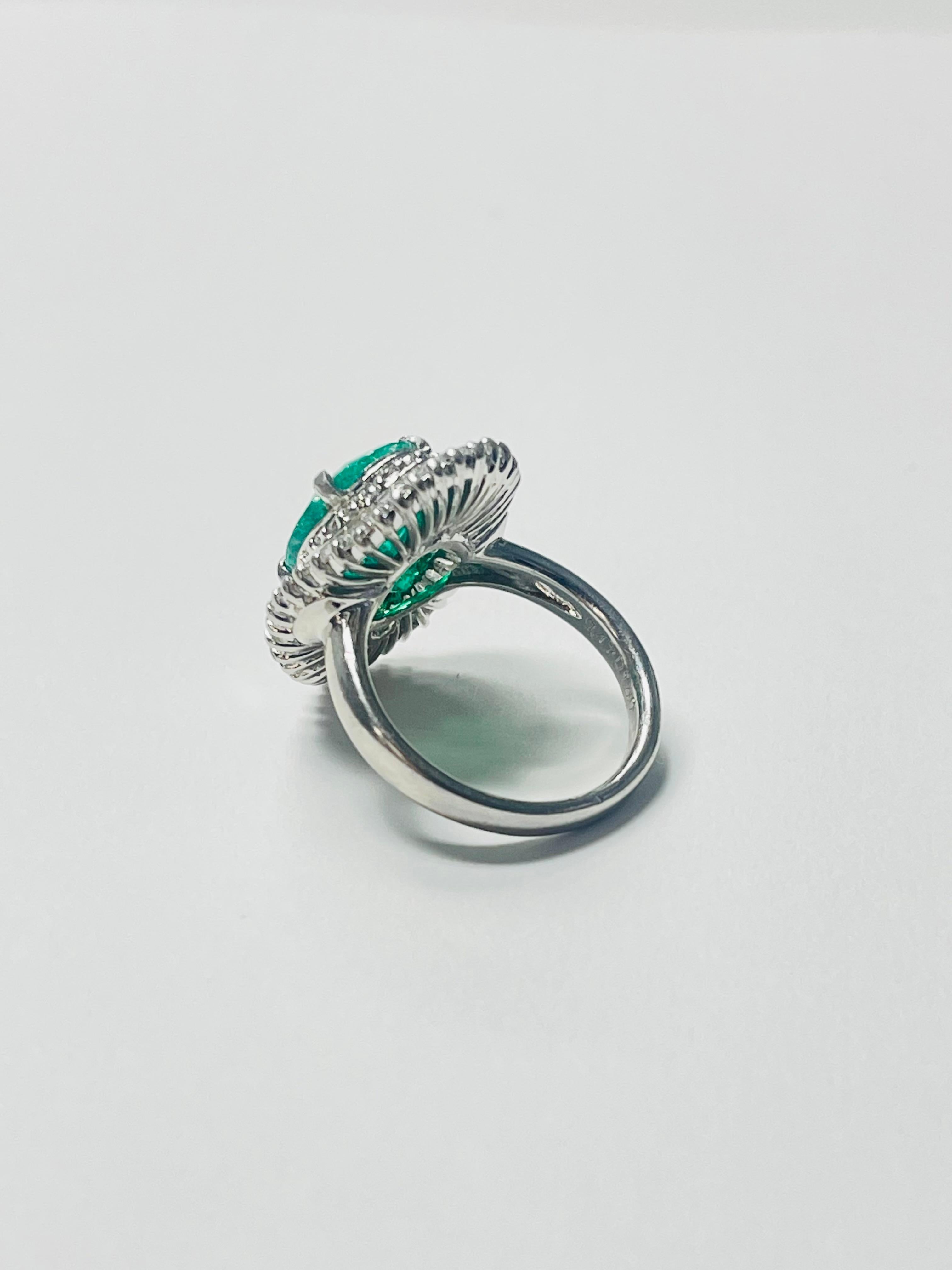 Women's Emerald Oval and Diamond Engagement Ring In Gold. For Sale