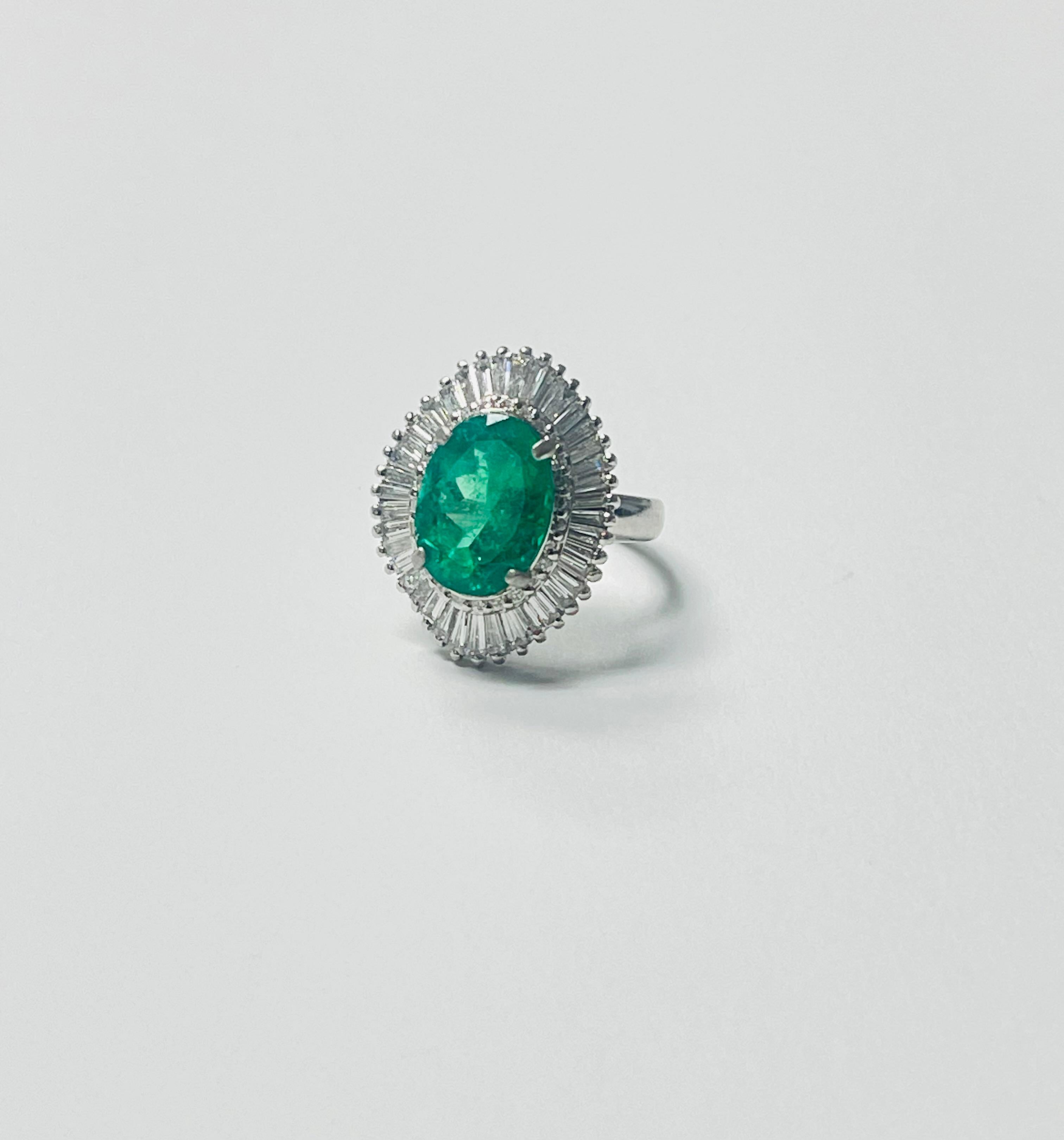 Emerald Oval and Diamond Engagement Ring In Gold. For Sale 1