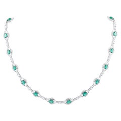 Emerald Oval And Diamond Necklace In 18K White Gold