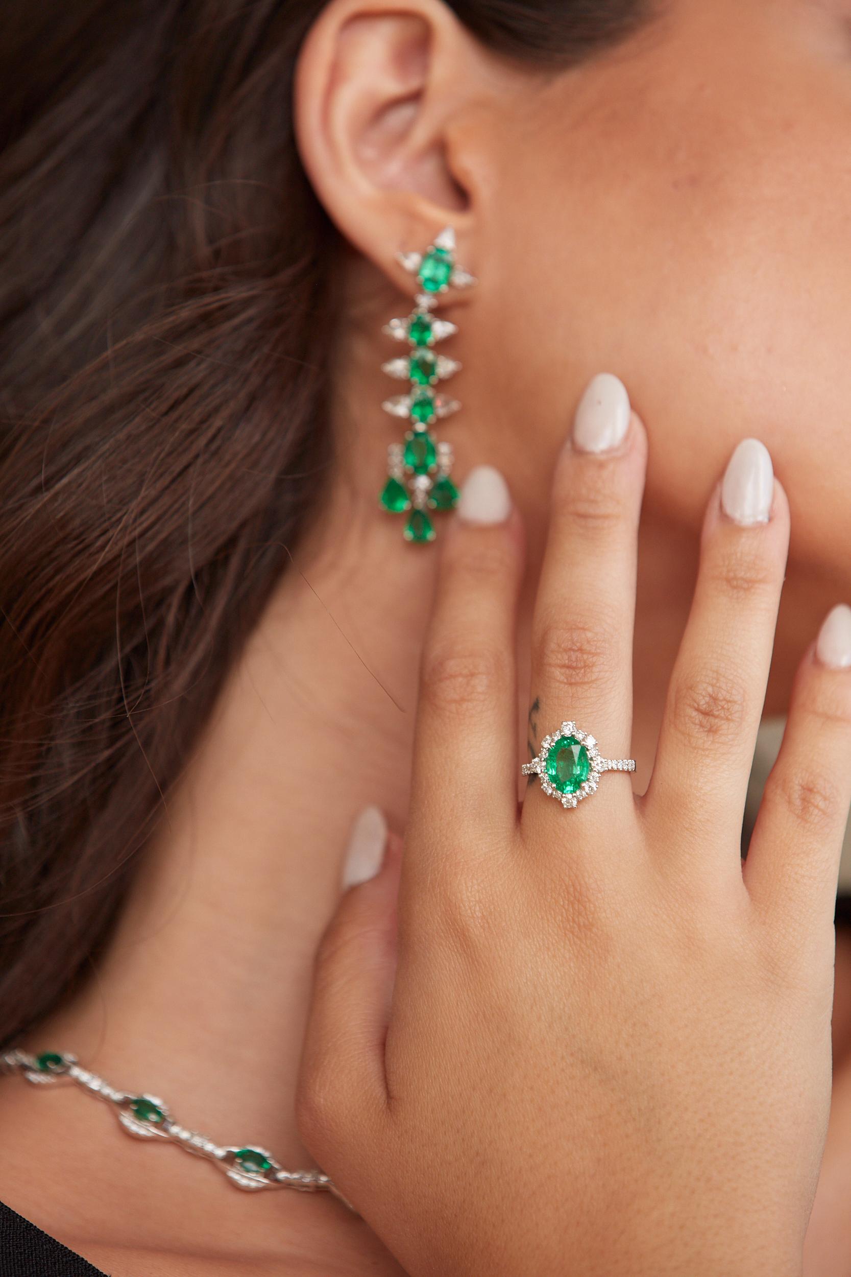 Tresor Diamond Ring features 0.95 cts diamond and 1.83 cts emerald in 18k white gold. The Ring are an ode to the luxurious yet classic beauty with sparkly diamonds. Their contemporary and modern design makes them versatile in their use. The Ring are