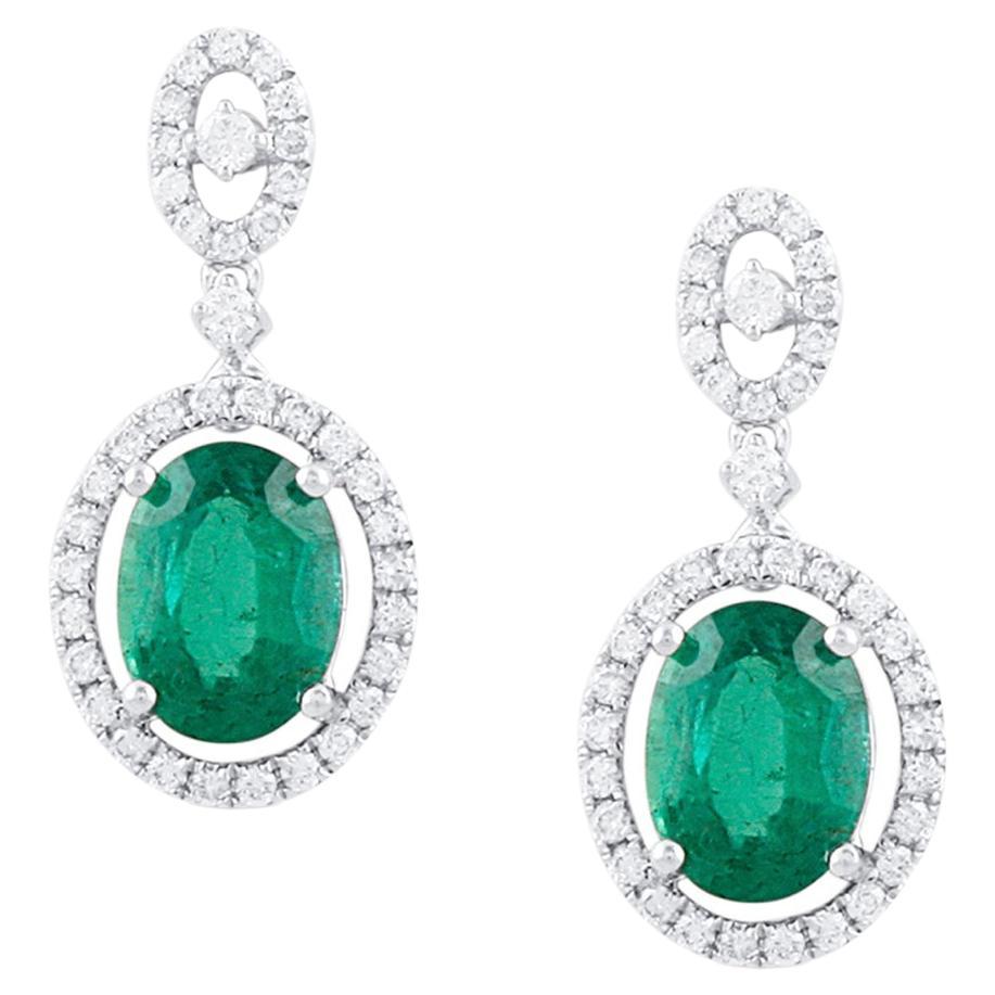Emerald Oval And Diamond Round Earring In 18K White Gold For Sale