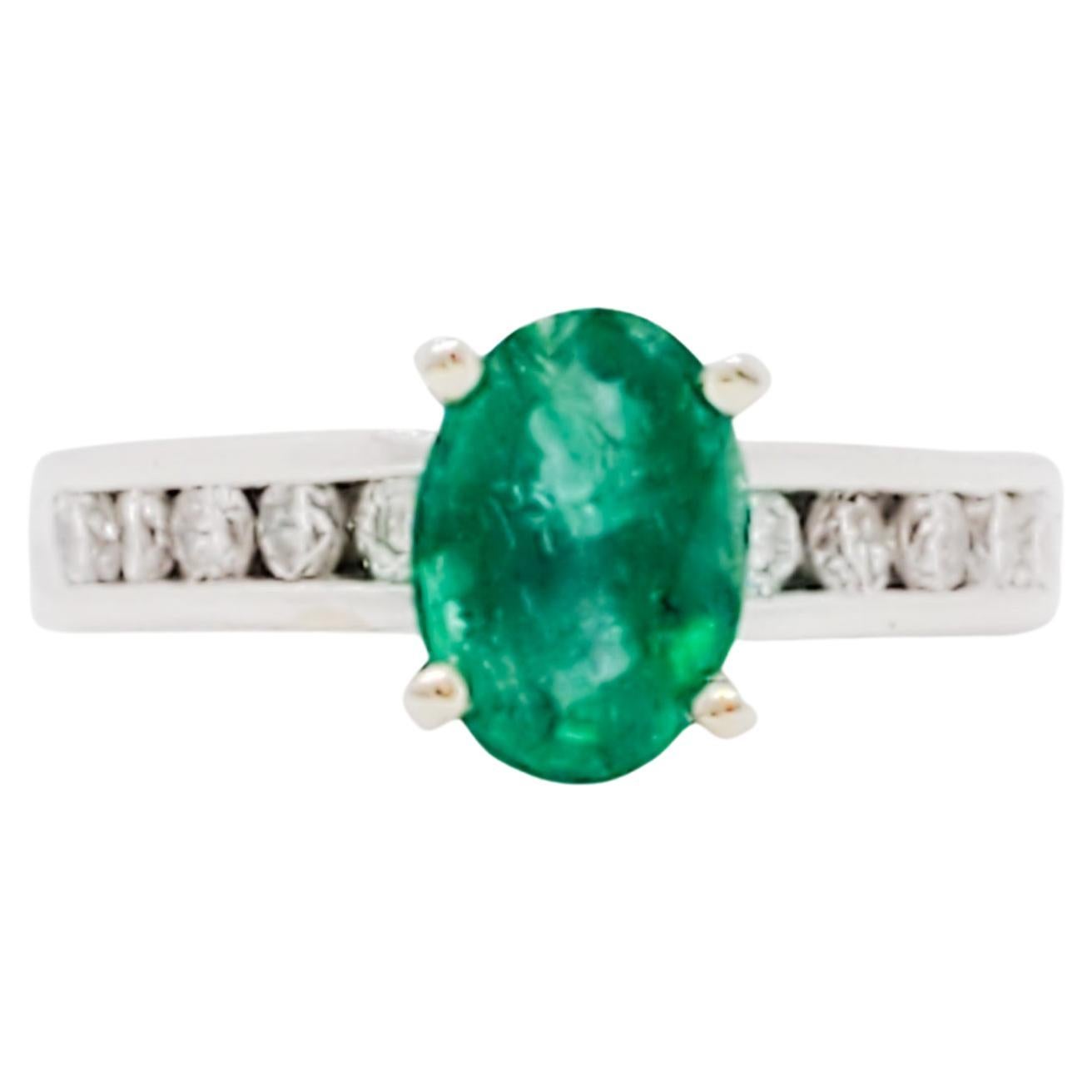 Emerald Oval and Diamond Solitaire Ring in 14k White Gold