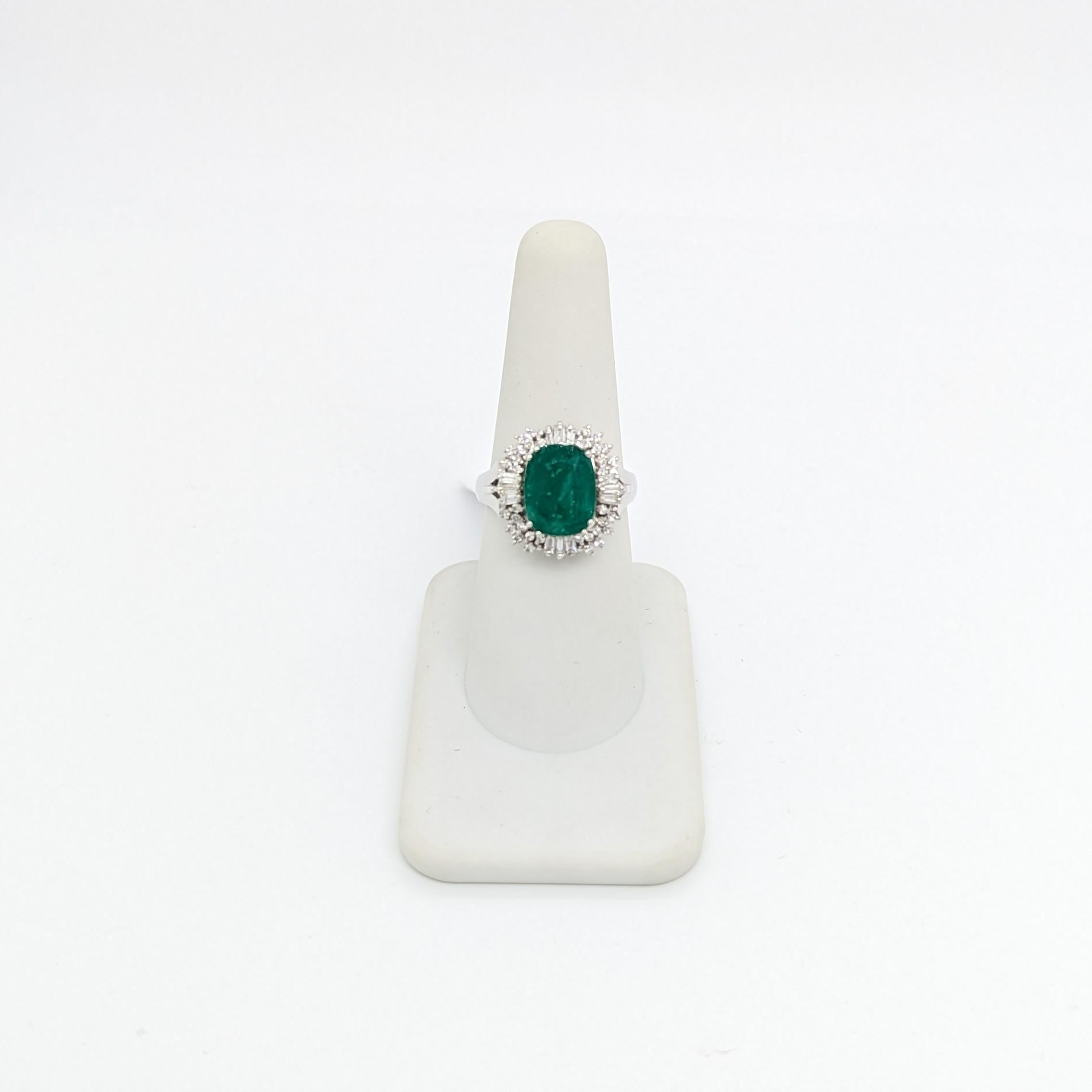 Women's or Men's Emerald Oval and White Diamond Cluster Ring in Platinum For Sale