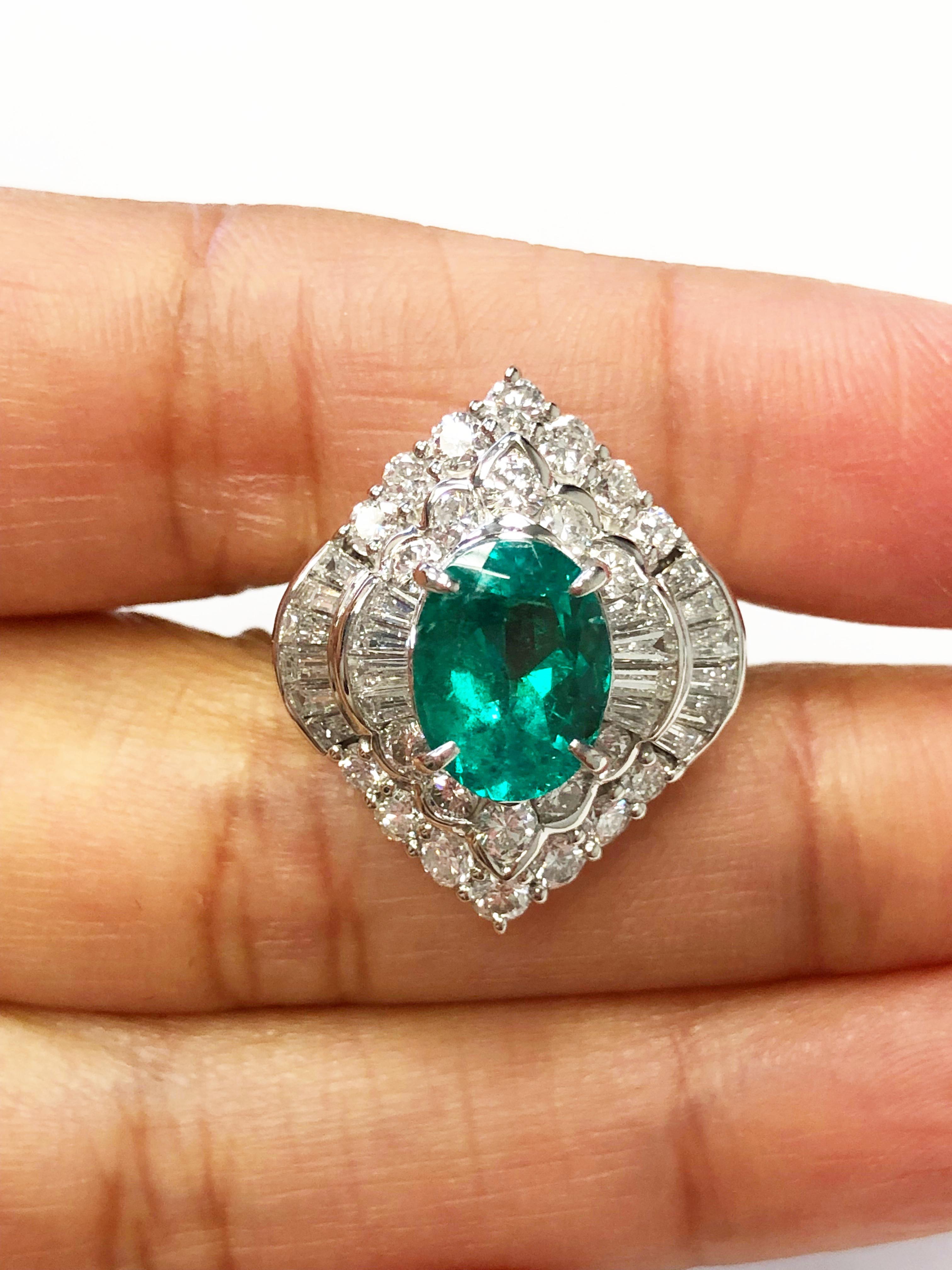 Emerald Oval and White Diamond Cocktail Ring in Platinum 1