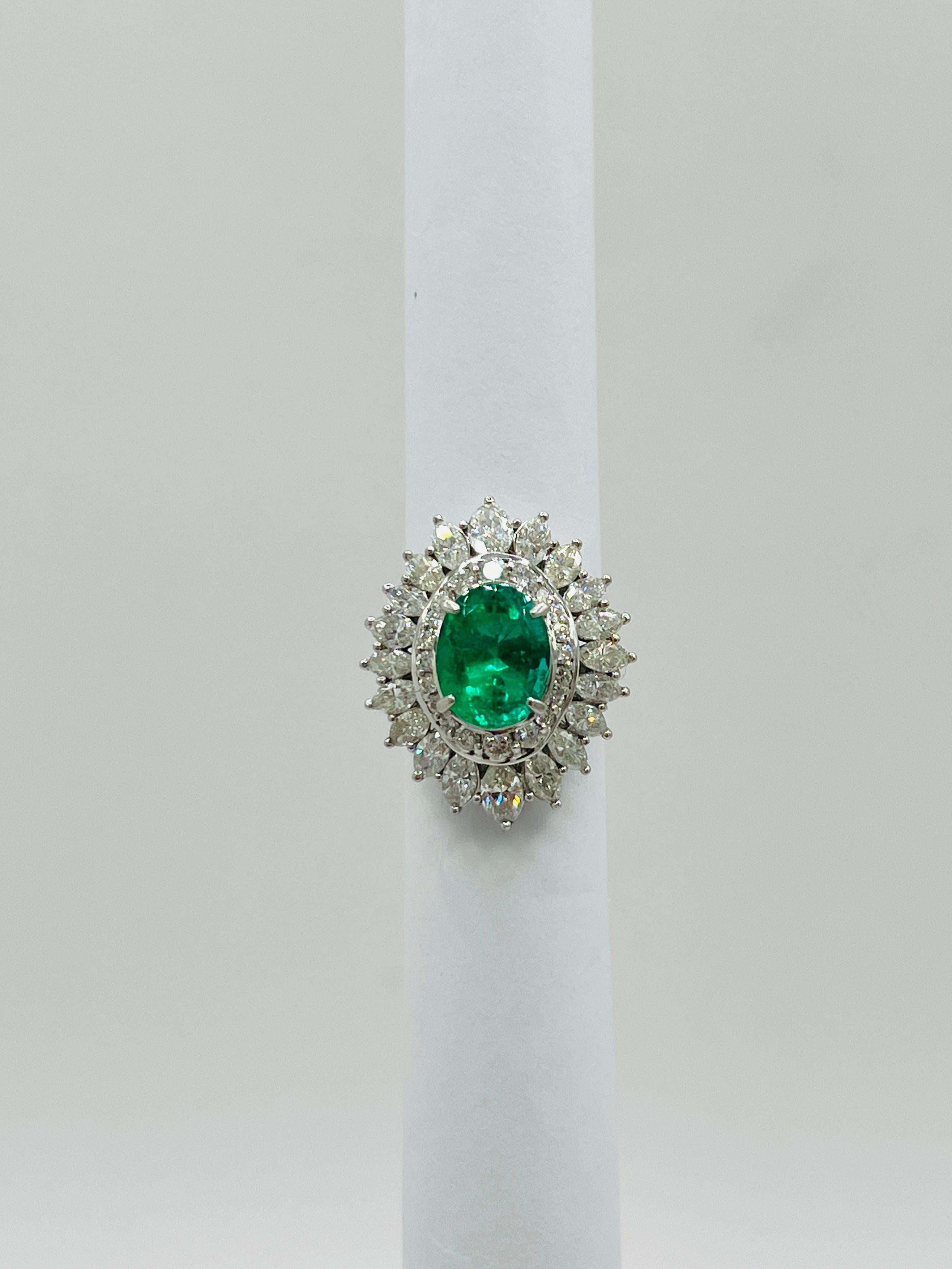 Colombian Emerald Oval and White Diamond Marquise Ring in Platinum In New Condition In Los Angeles, CA