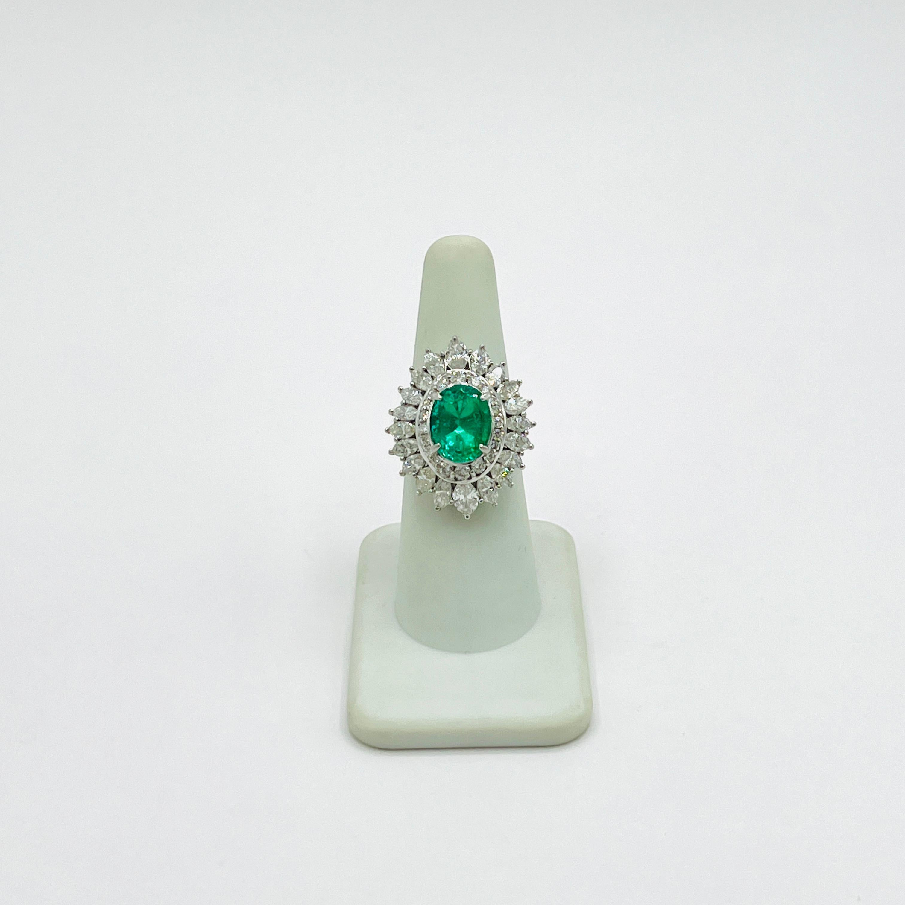 Women's or Men's Colombian Emerald Oval and White Diamond Marquise Ring in Platinum