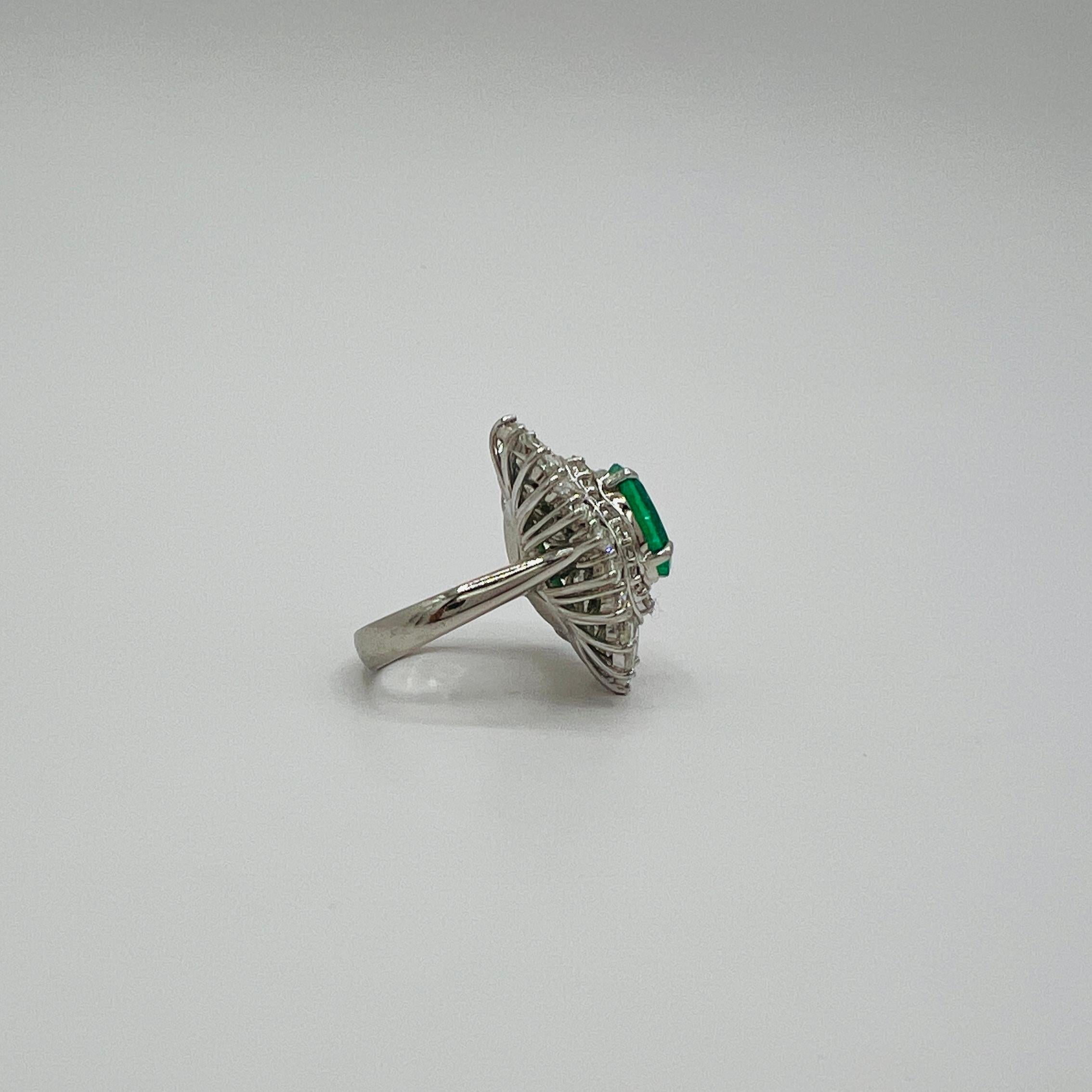 Colombian Emerald Oval and White Diamond Marquise Ring in Platinum 1