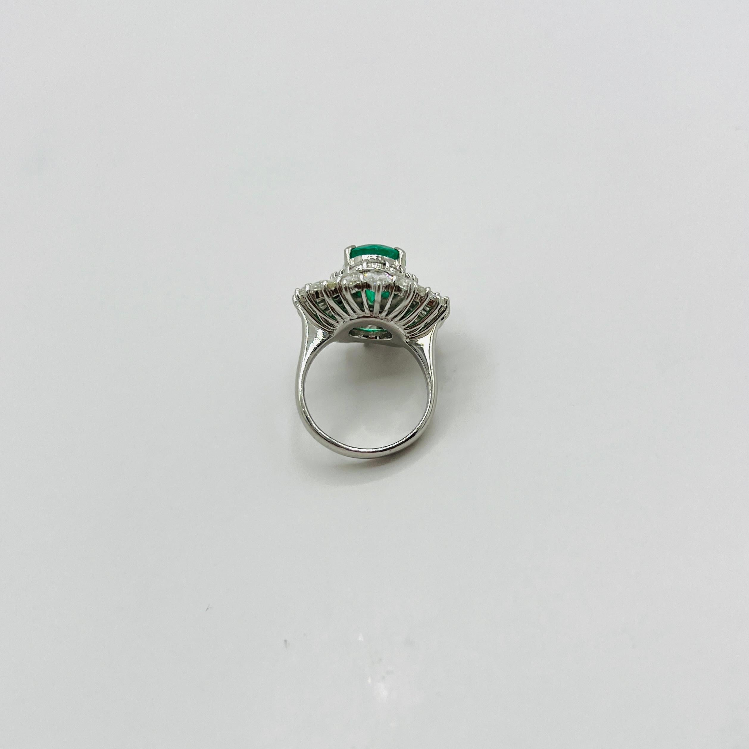 Colombian Emerald Oval and White Diamond Marquise Ring in Platinum 2