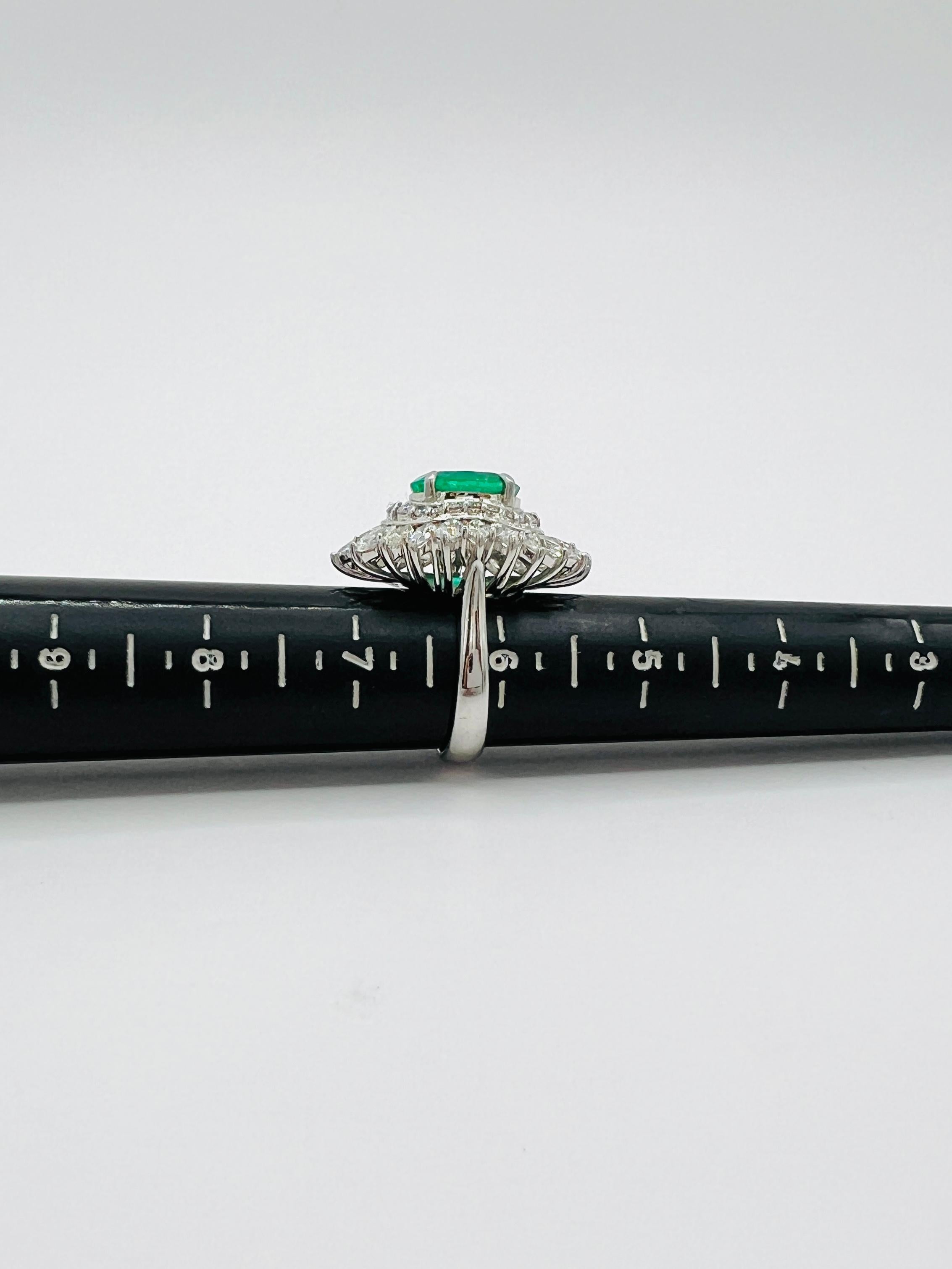 Colombian Emerald Oval and White Diamond Marquise Ring in Platinum 3