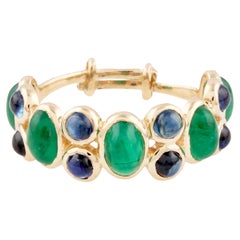 Esmeralda Oval y Zafiro Azul Anillo Redondo en Oro Amarillo de 18K