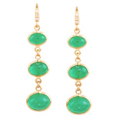 Boucle d'oreille en or jaune 18K avec émeraude ovale et diamant