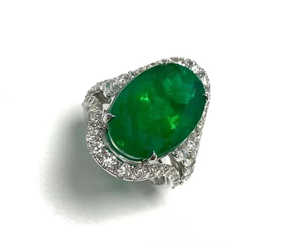 Emerald Weight: 10.90 cts, Diamond Weight: 2.26 cts, 18K white gold, Shape: Oval, Color: Green, Hardness: 7.5-8, Birthstone: May