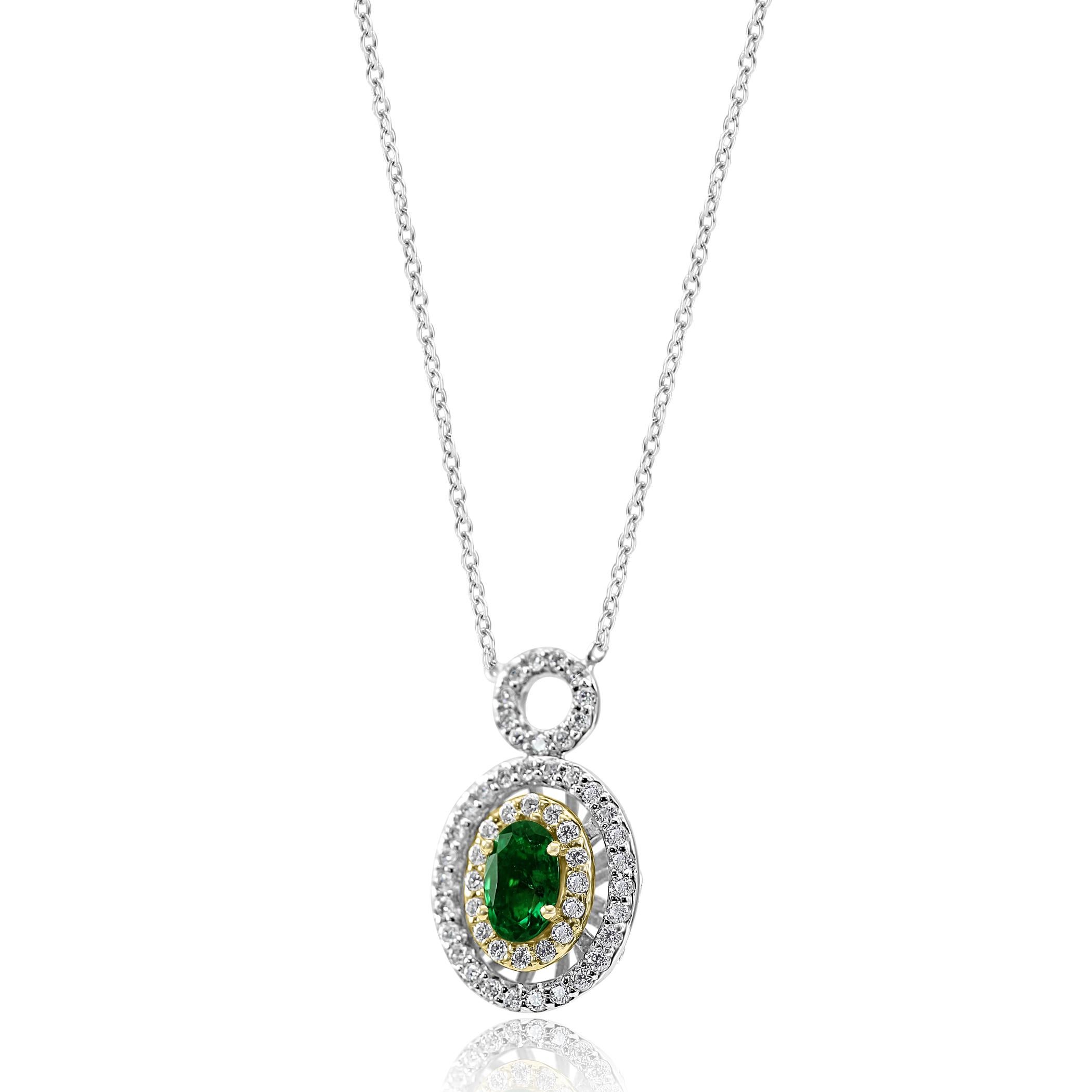 1 Emerald Oval 0.43 Carat Encircled in Double Halo of 59 White G-H Color VS-SI clarity Diamond Rounds 0.52 carat set in stunning 14K White and Yellow Gold Pendant Diamond By Yard Chain Necklace .

Total Stone Weight 0.95 Carat

Style available in