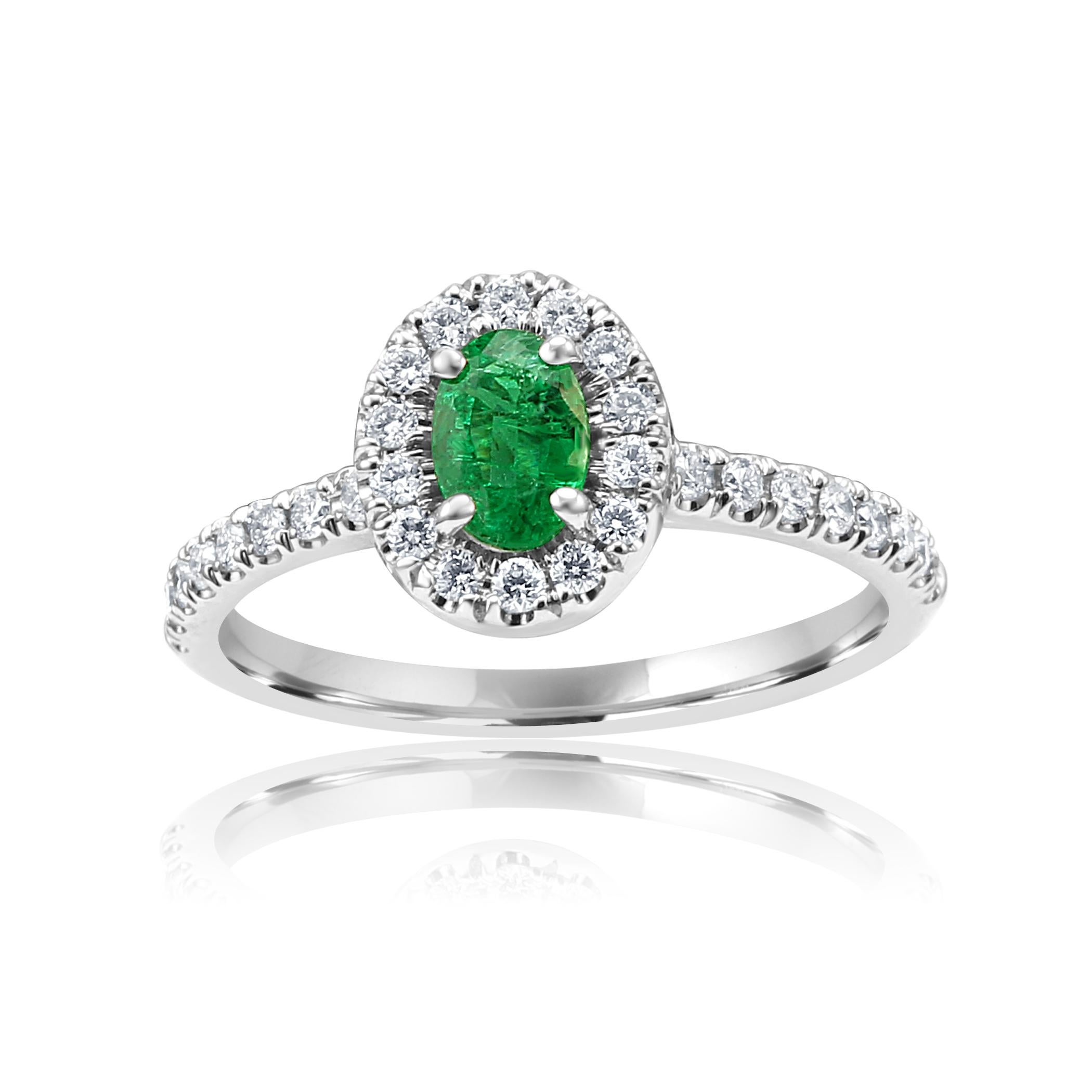 Emerald Oval 0.50 Carat Encircled in Single Halo of Colorless Round Brilliant VS-SI Diamonds 0.35 Carat Set in 14K White Gold Bridal Fashion cocktail Ring.

Style available in different price ranges. Prices are based on your selection of 4C's Cut,