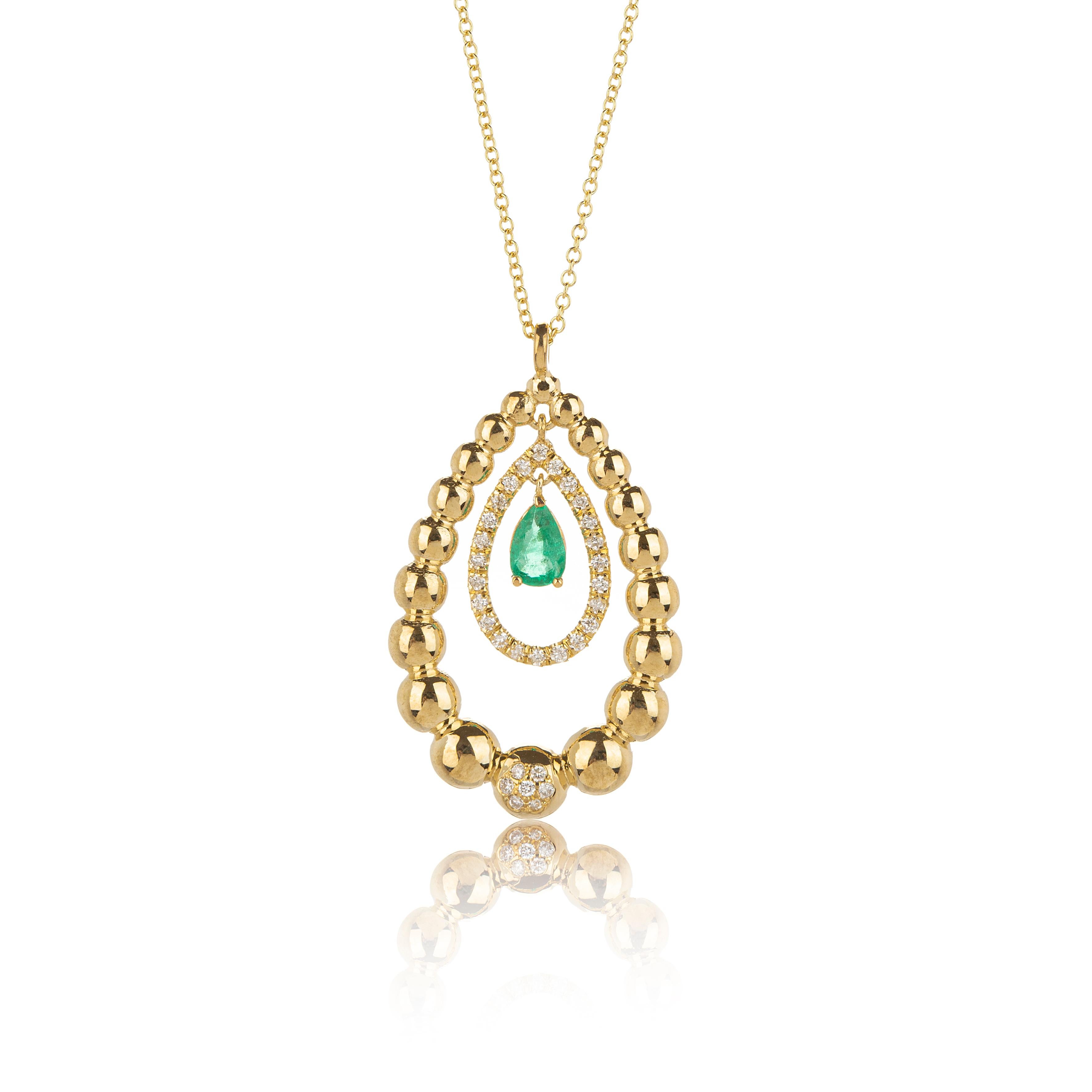 Emerald Pear Cut and Pear  Shape Necklace in 18Kt Gold with Diamonds. The necklace is graduated in three different levels. The emerald stone in the center of the necklace, has a nice and sweet delicate movement and the pear cut makes it even more