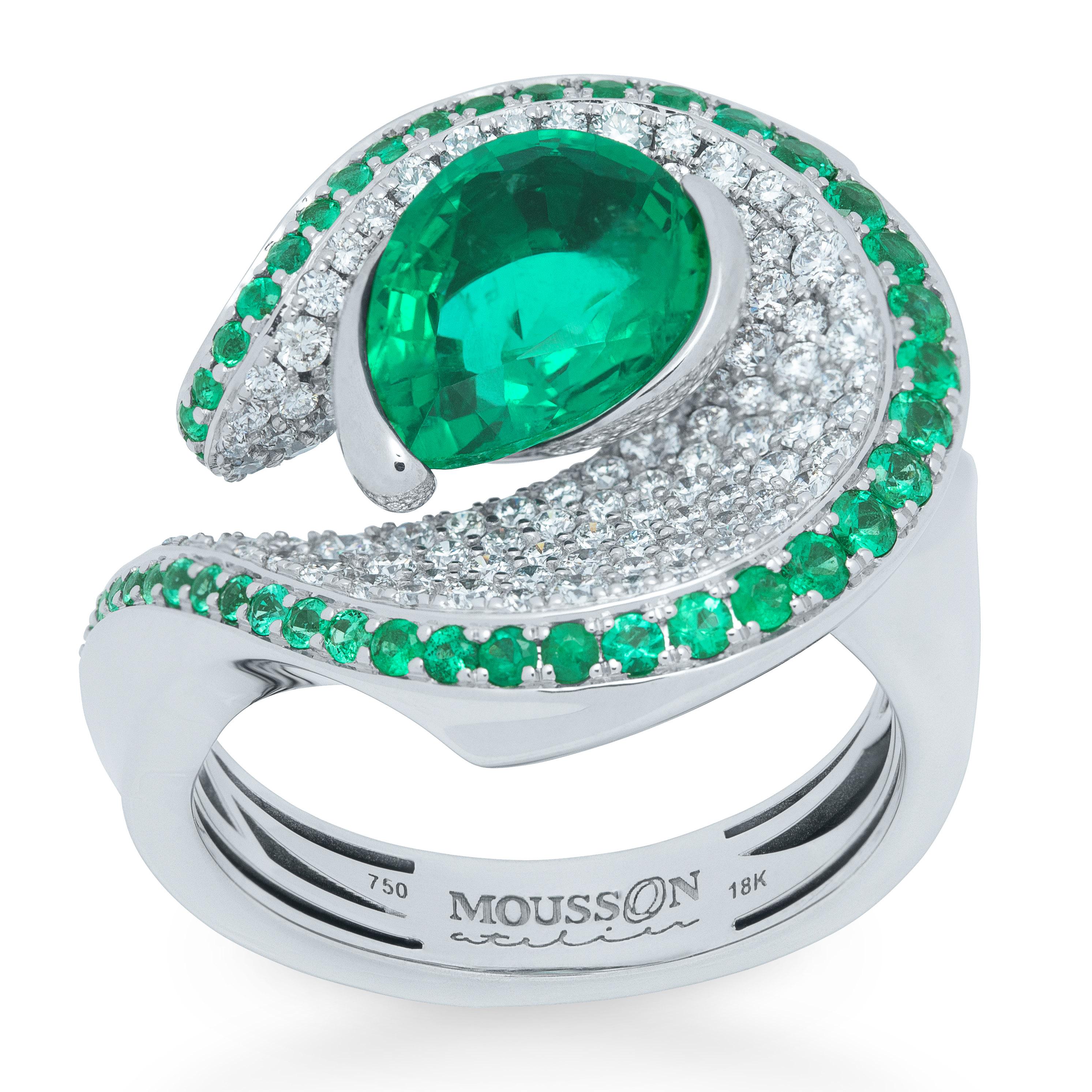 Emerald Pear Shape 2.03 Carat Diamonds Emeralds 18 Karat White Gold Ring
Contrasting colors are always eye-catching. Our new Ring is one of those. A bright Pear-shaped 2.03 Carat Emerald rests on a snow-white plateau of 104 Diamonds, which are